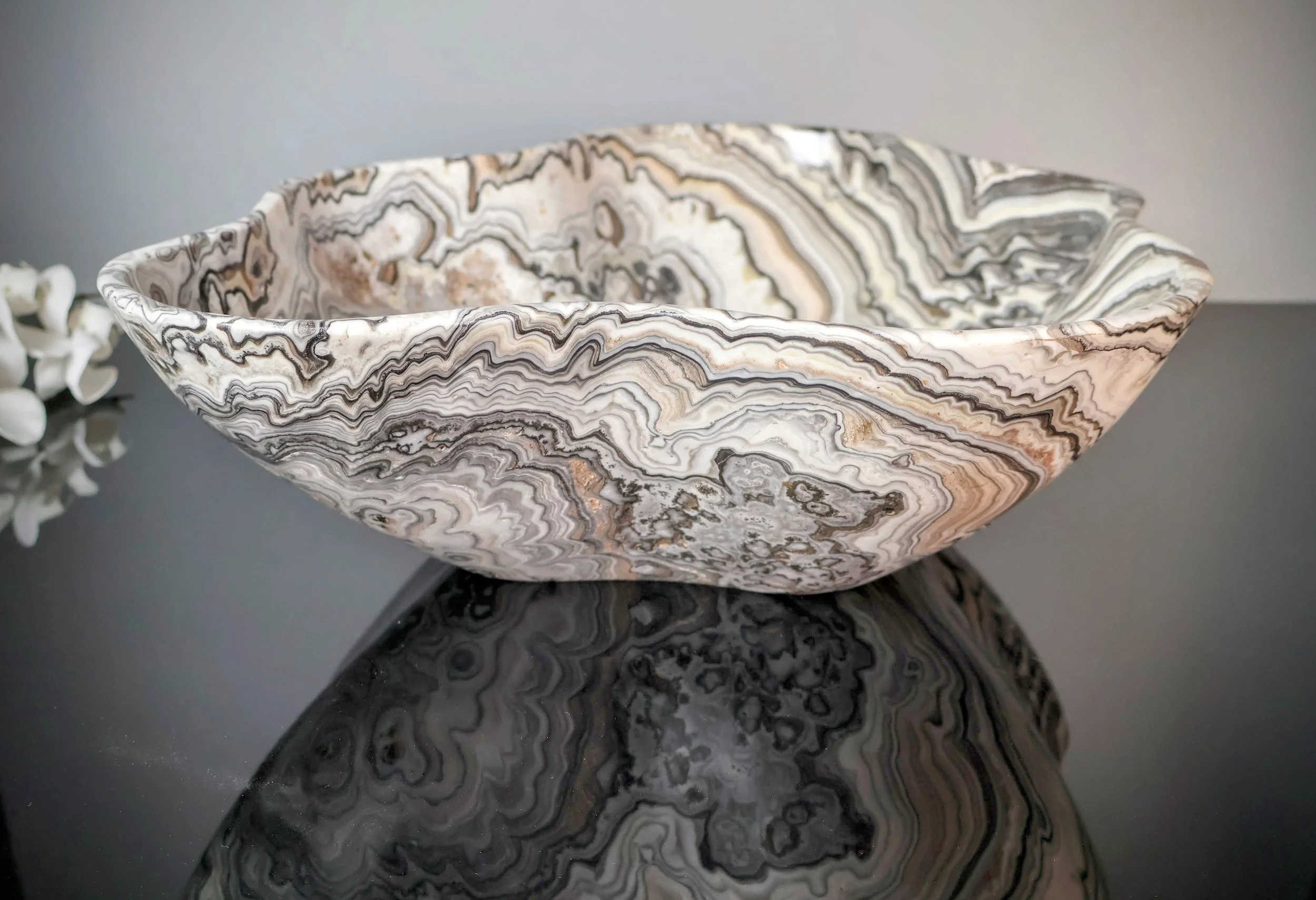 side view of onyx bowl with gorgeous zebra banding