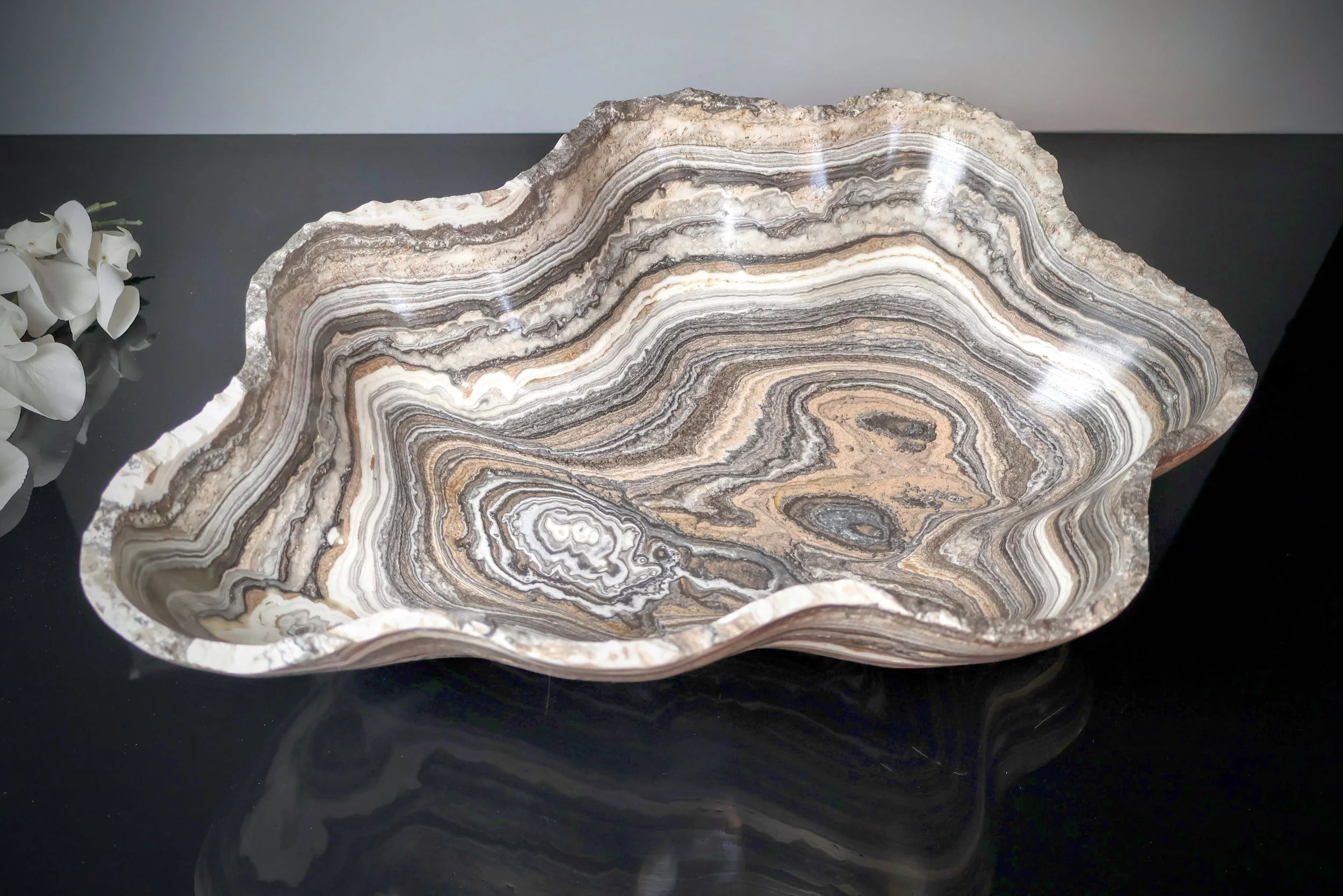 large zebra onyx bowl on shiny surface