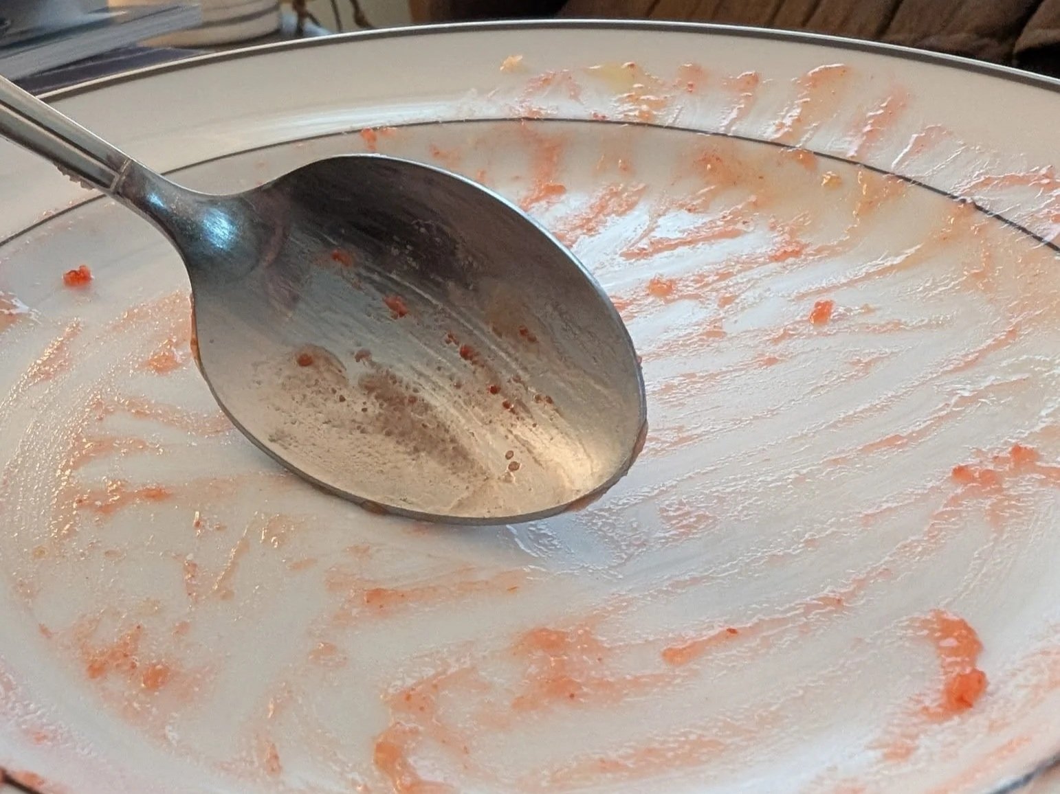 Empty plate of Lemon Cherry Cream Cheese Dump Cake