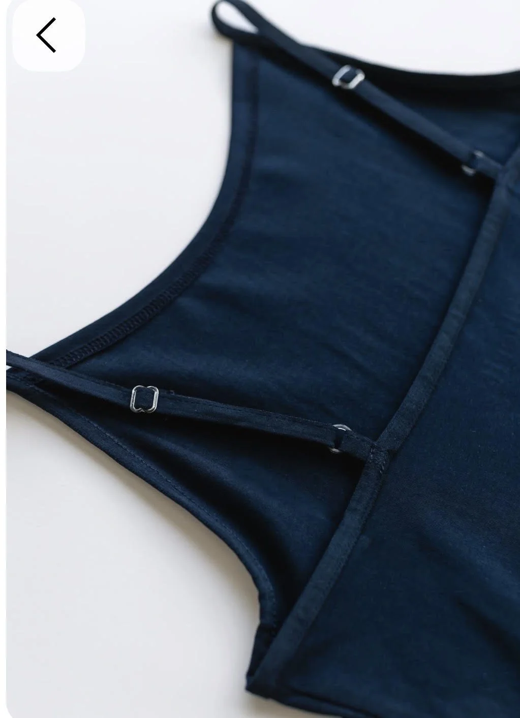 Strap on a dark blue shirt