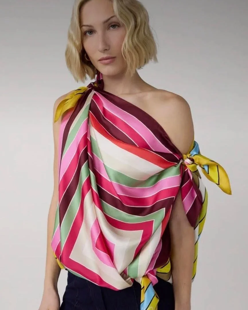 Woman wearing a scarf top