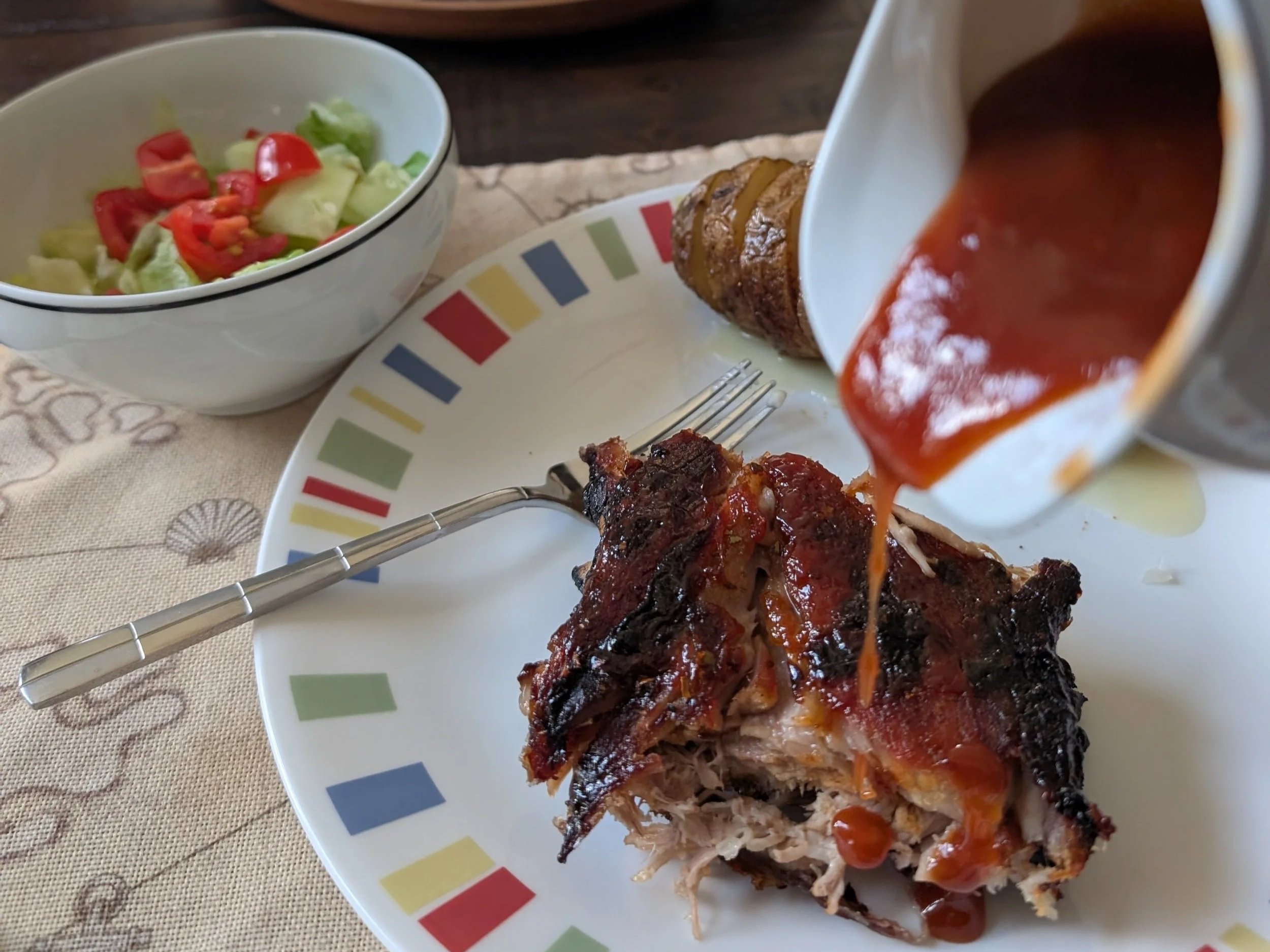 Ribs with rib sauce and side salad