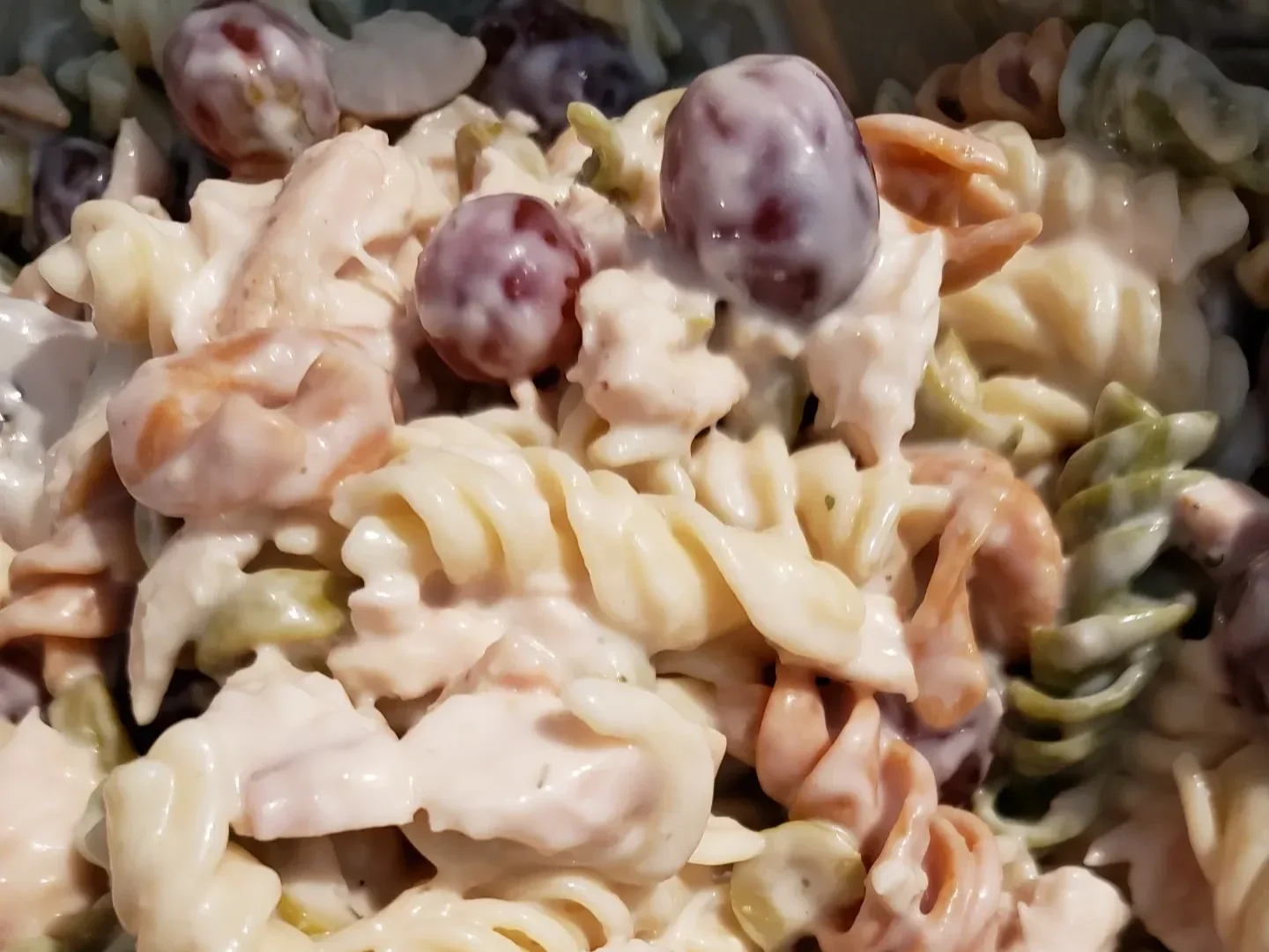 Up close view of sweet and savory pasta salad