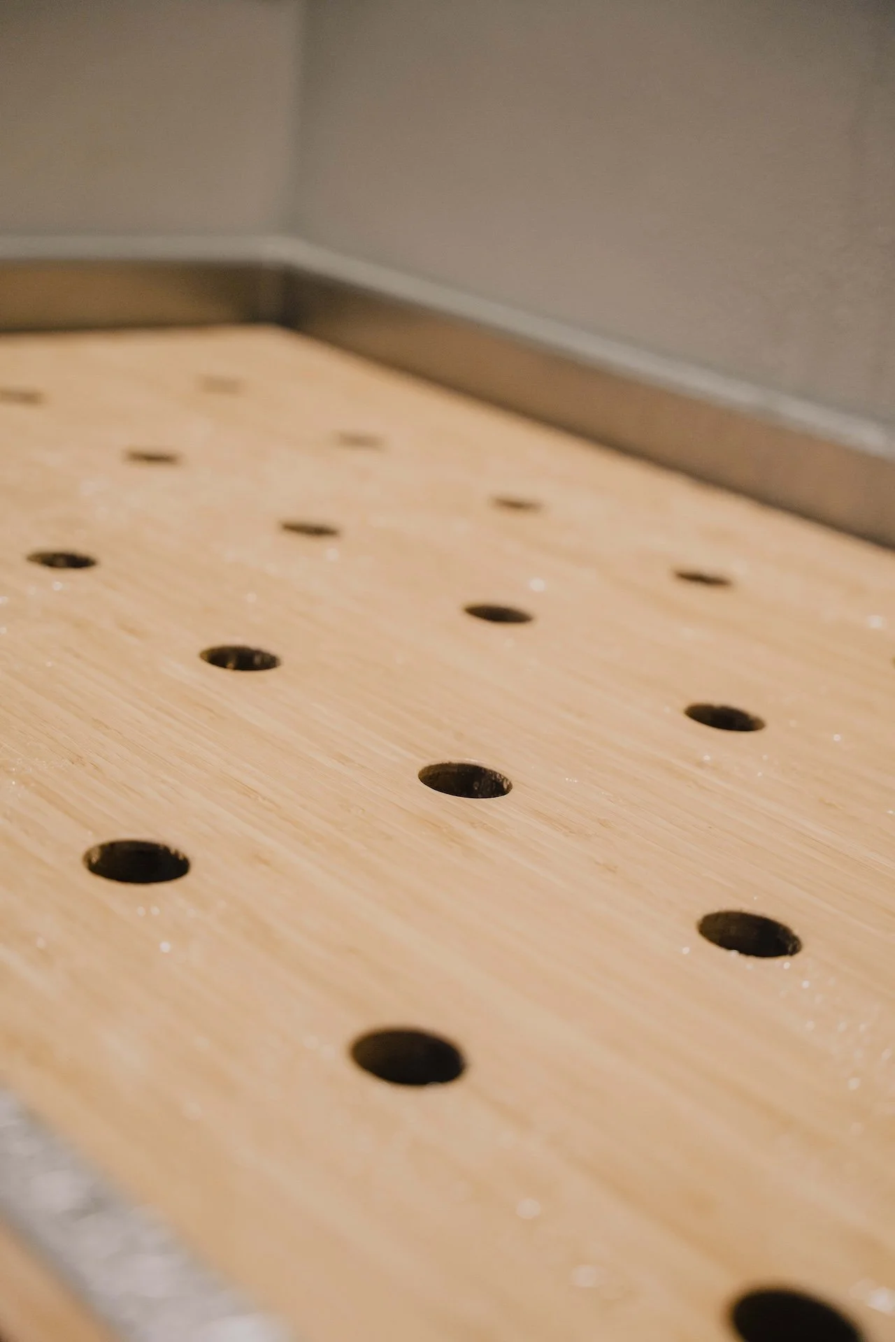 Stainless steel shower tray with bamboo duckboard.jpg