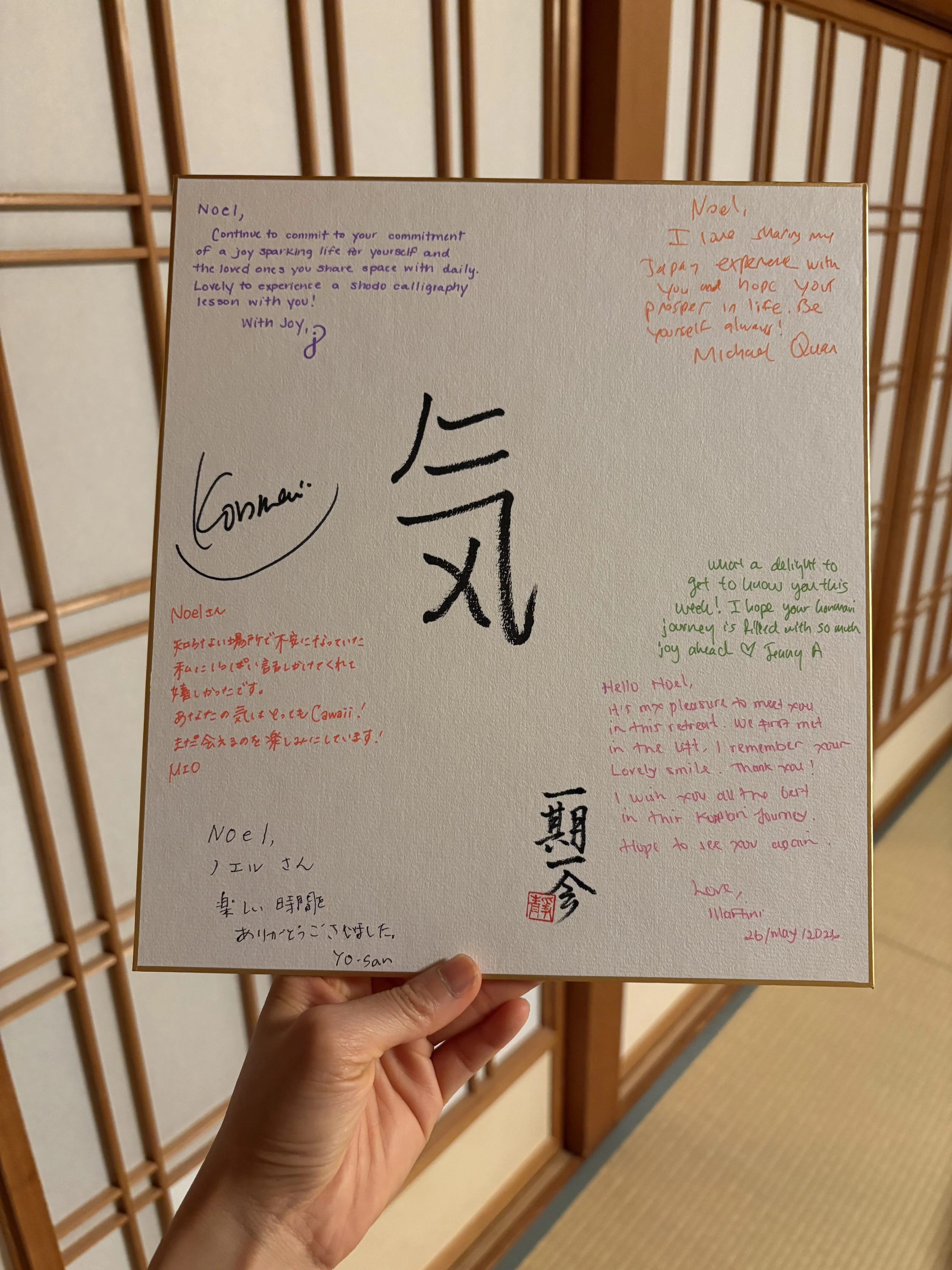 A signed Japanese shodo calligraphy board from Marie Kondo and professional home organizing consultants at a KonMari retreat