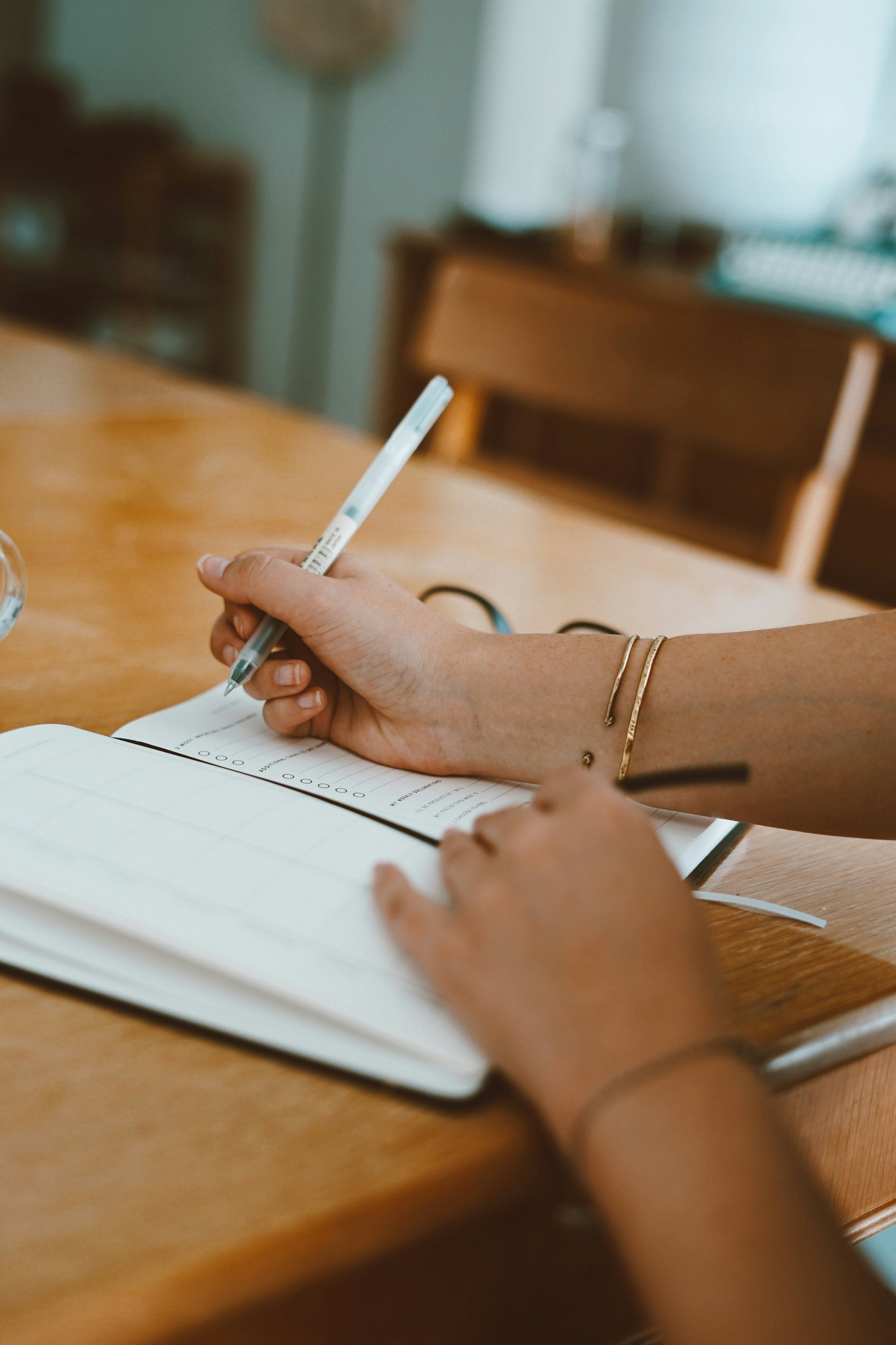 Person writing in journal, KonMari Method, Tumwater, Washington, Thurston County