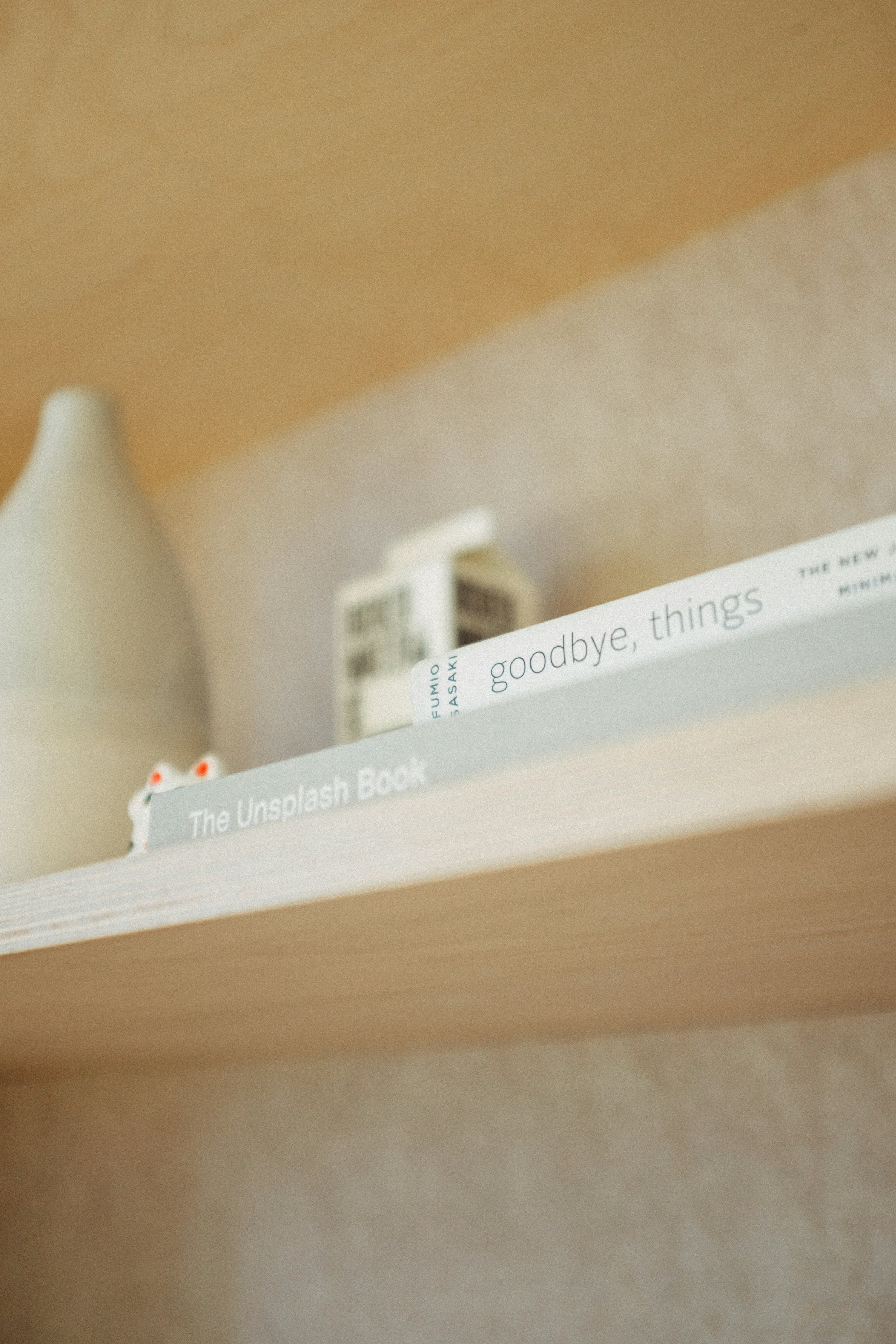 Minimalist shelf with the book Goodbye Things, representing a KonMari tidying festival in Thurston County, Washington
