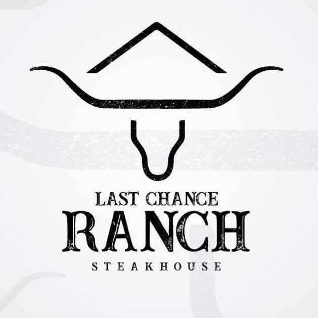 Logo for Last Chance Ranch Steakhouse featuring a stylized cow skull with a mountain outline above it.