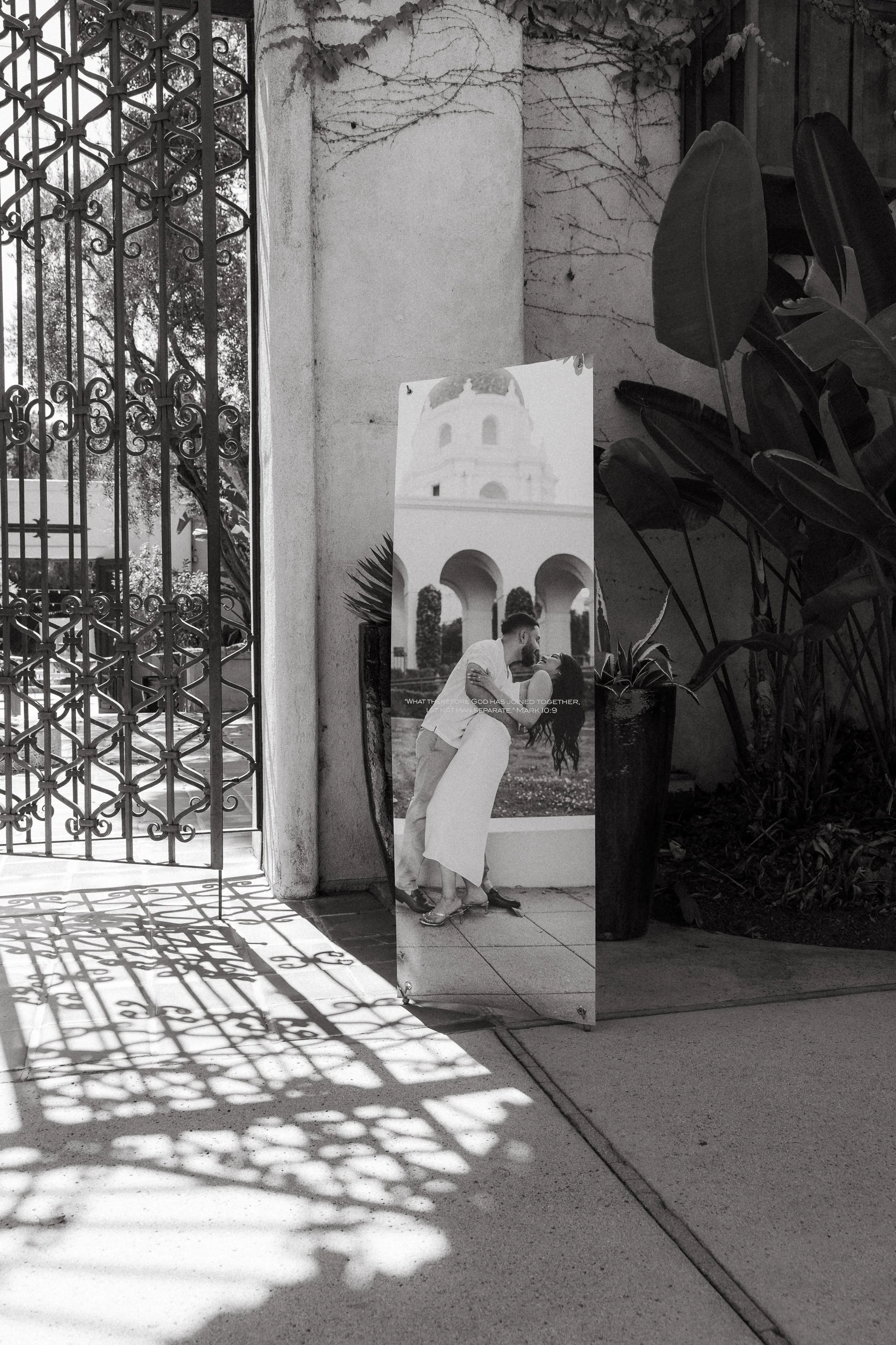 Black and white photo display at entrance of Los Angeles River Center wedding