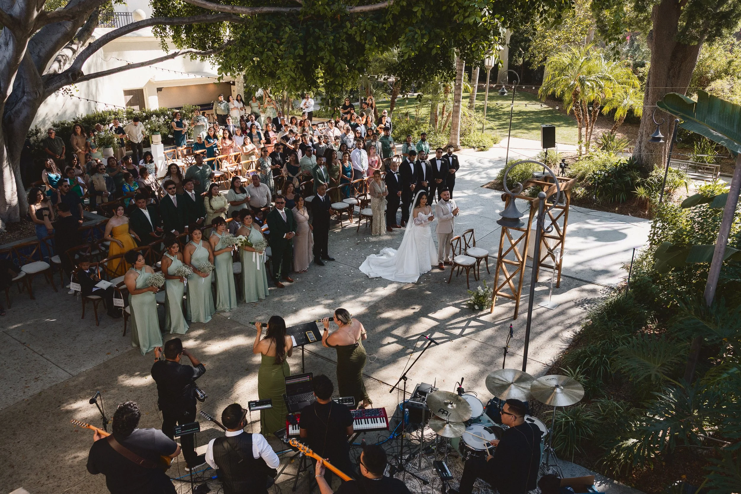 Live worship band playing music during outdoor wedding ceremony