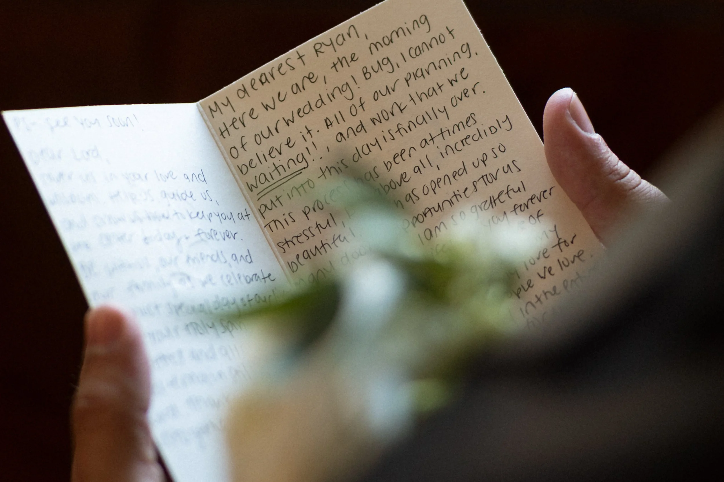 Hands holding a handwritten letter during quiet getting-ready moments