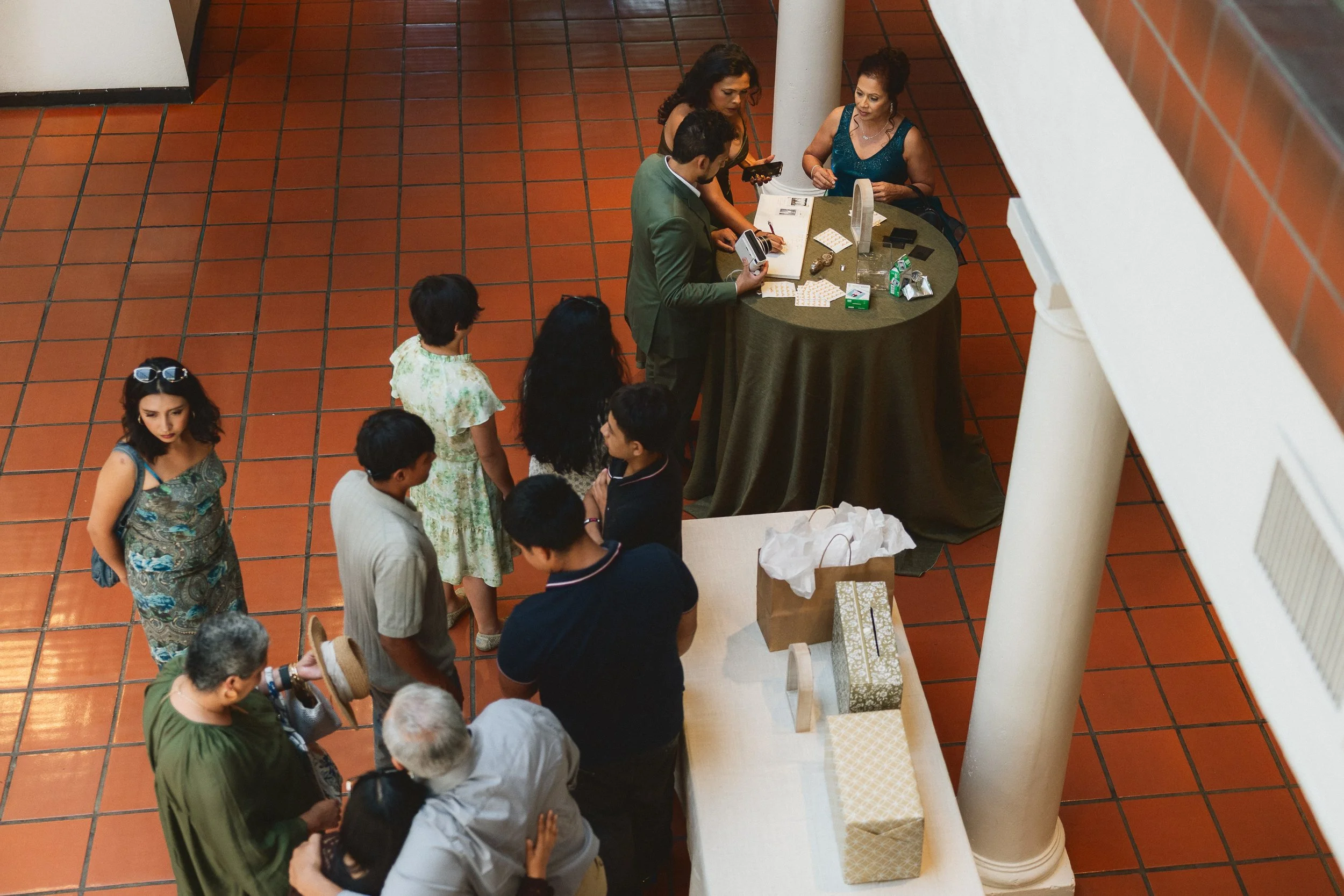 Guests checking in and greeting each other at Los Angeles River Center