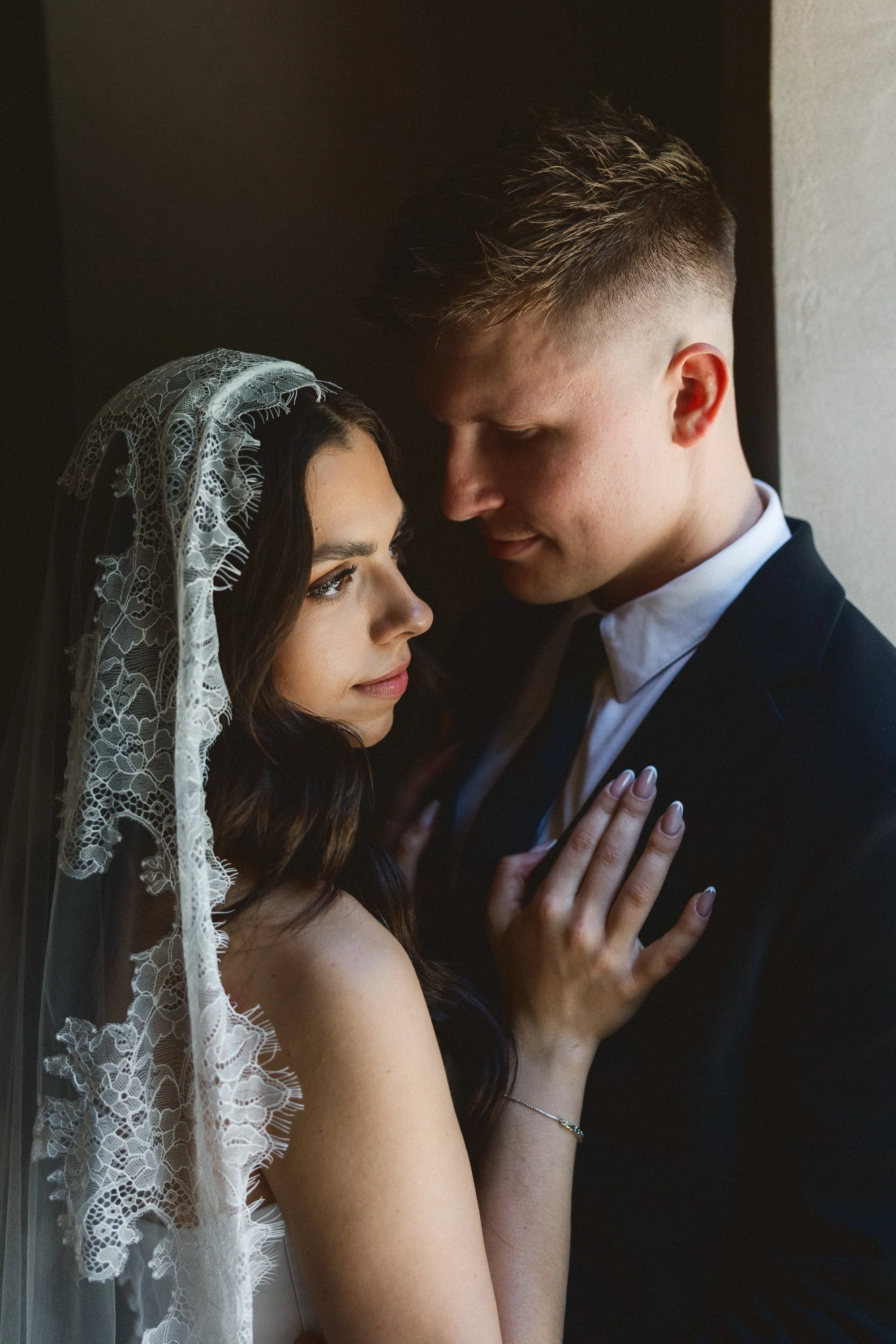 Bride and groom share a quiet, intimate moment