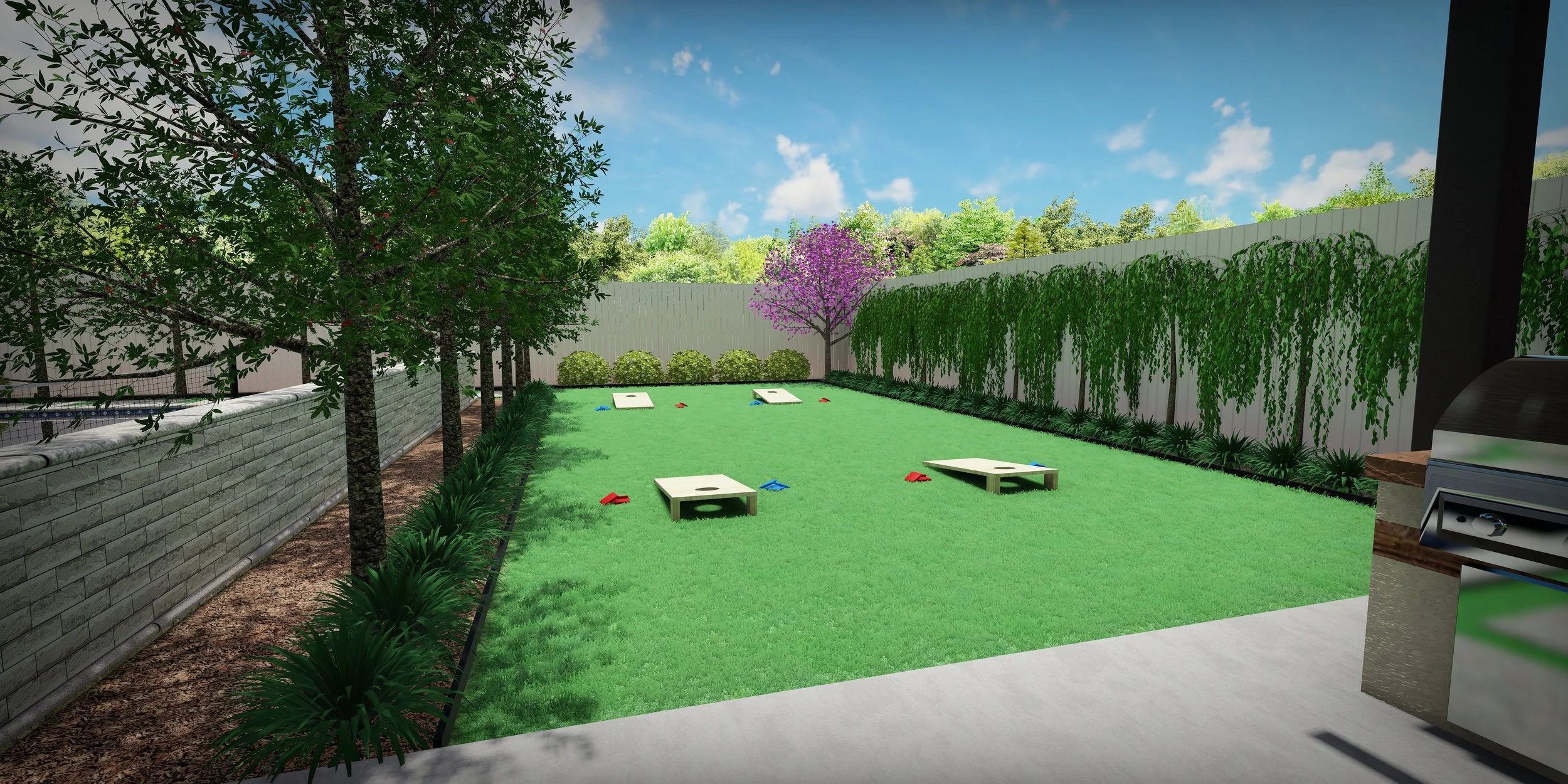 Backyard with green grass, trees, and a white fence, featuring cornhole boards and bean bags for outdoor game.