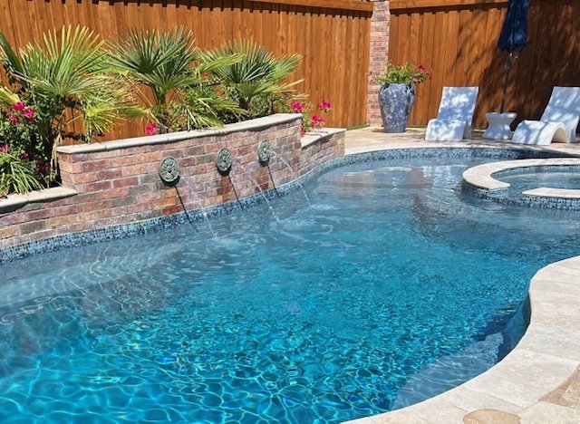 14x30 with water feature ivory coping.jpg