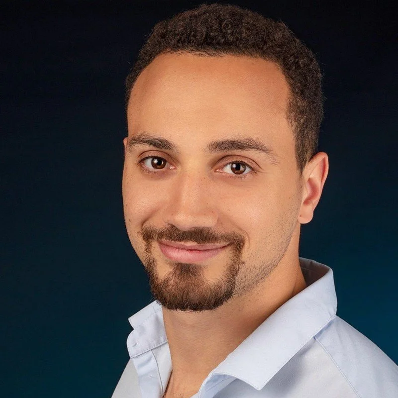 gregory frank headshot.jpeg