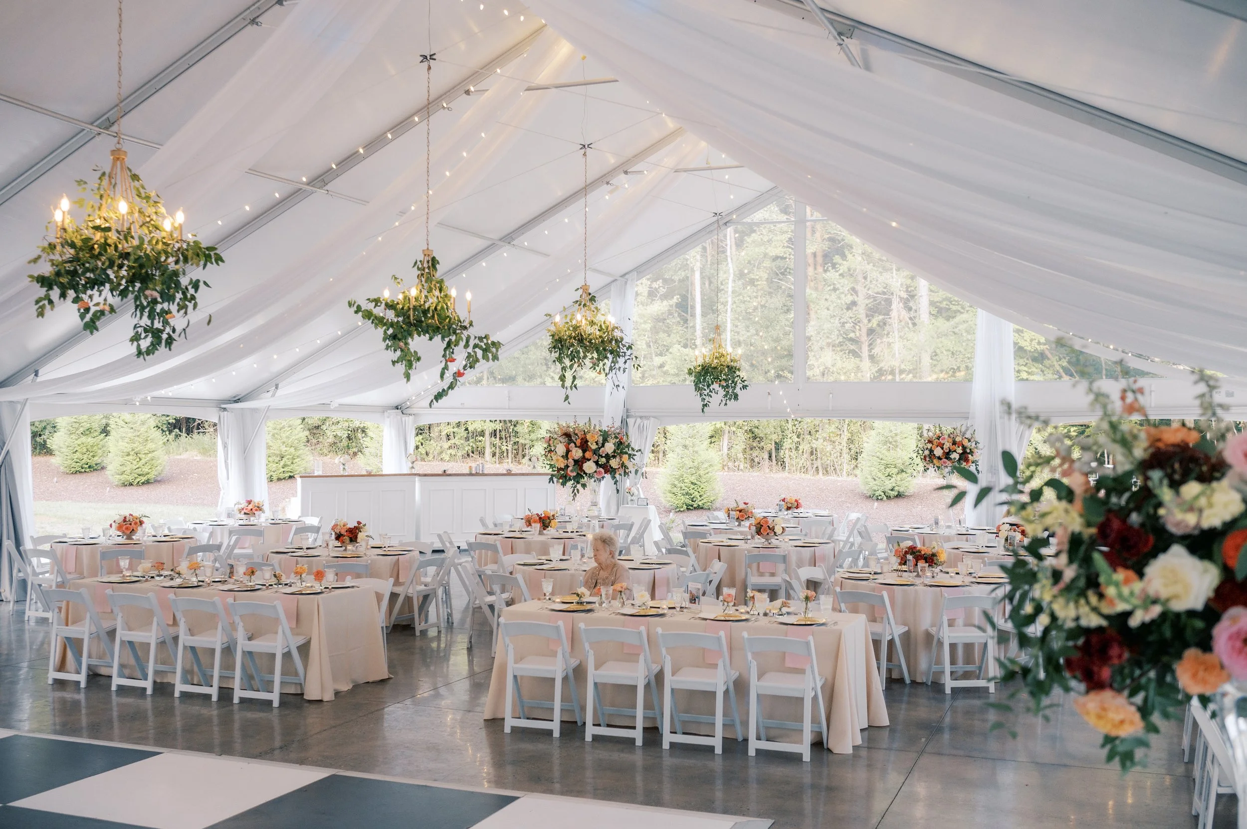 Chandelier greenery in tented reception