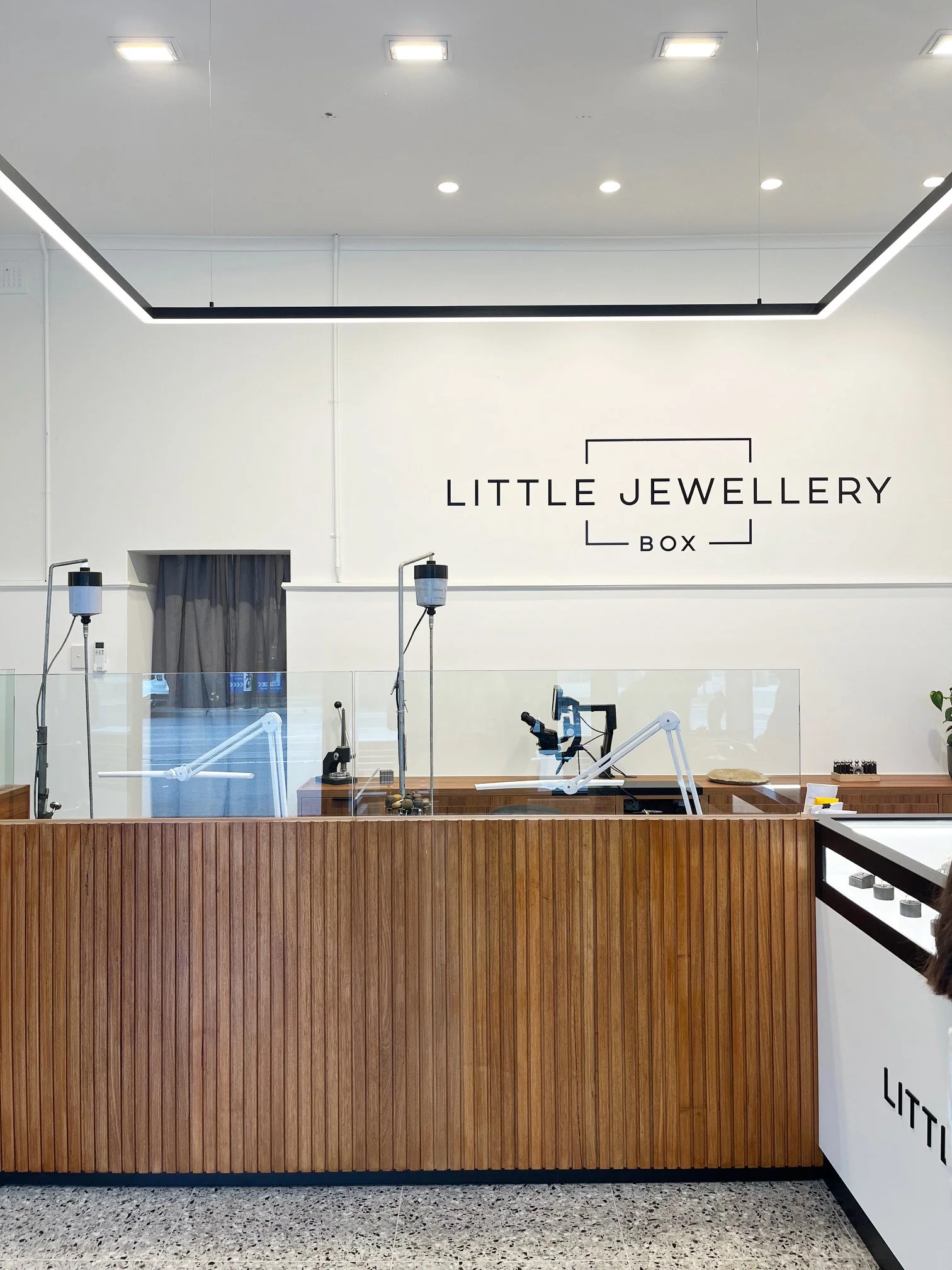image of the work area connected to the retail area in a retail jewellery store bespoke interior design
