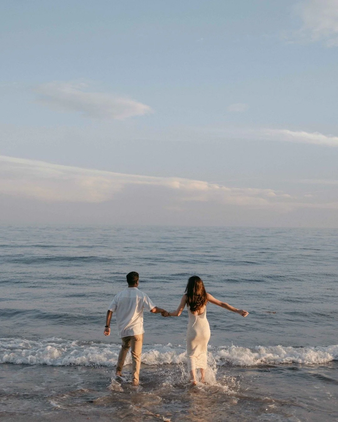 A love story written by the sea, framed by light. 🌊