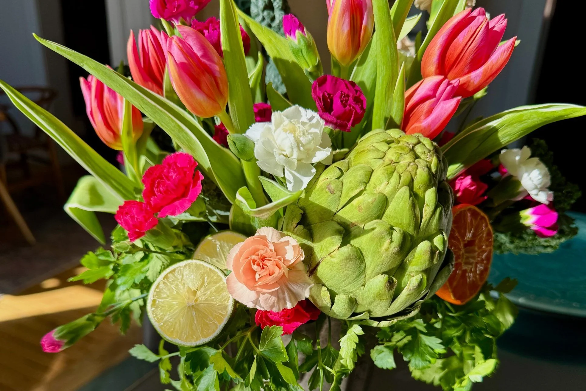 Cover of Look What I Put in a Vase, an arrangement of tulips, carnations and an artichoke