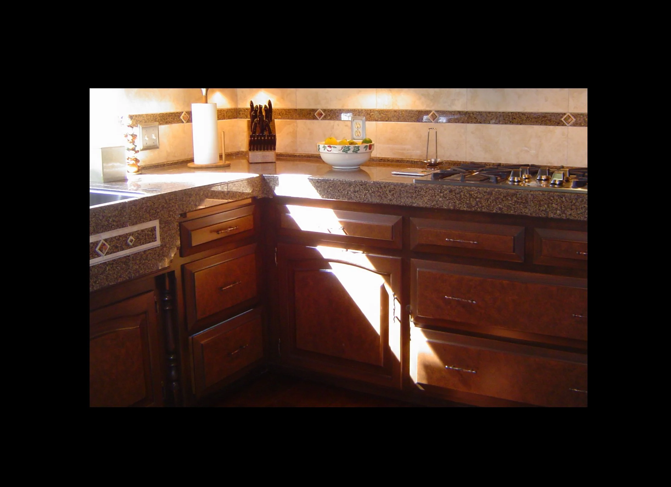 Granite Travertine and Onyx Kitchen.jpg