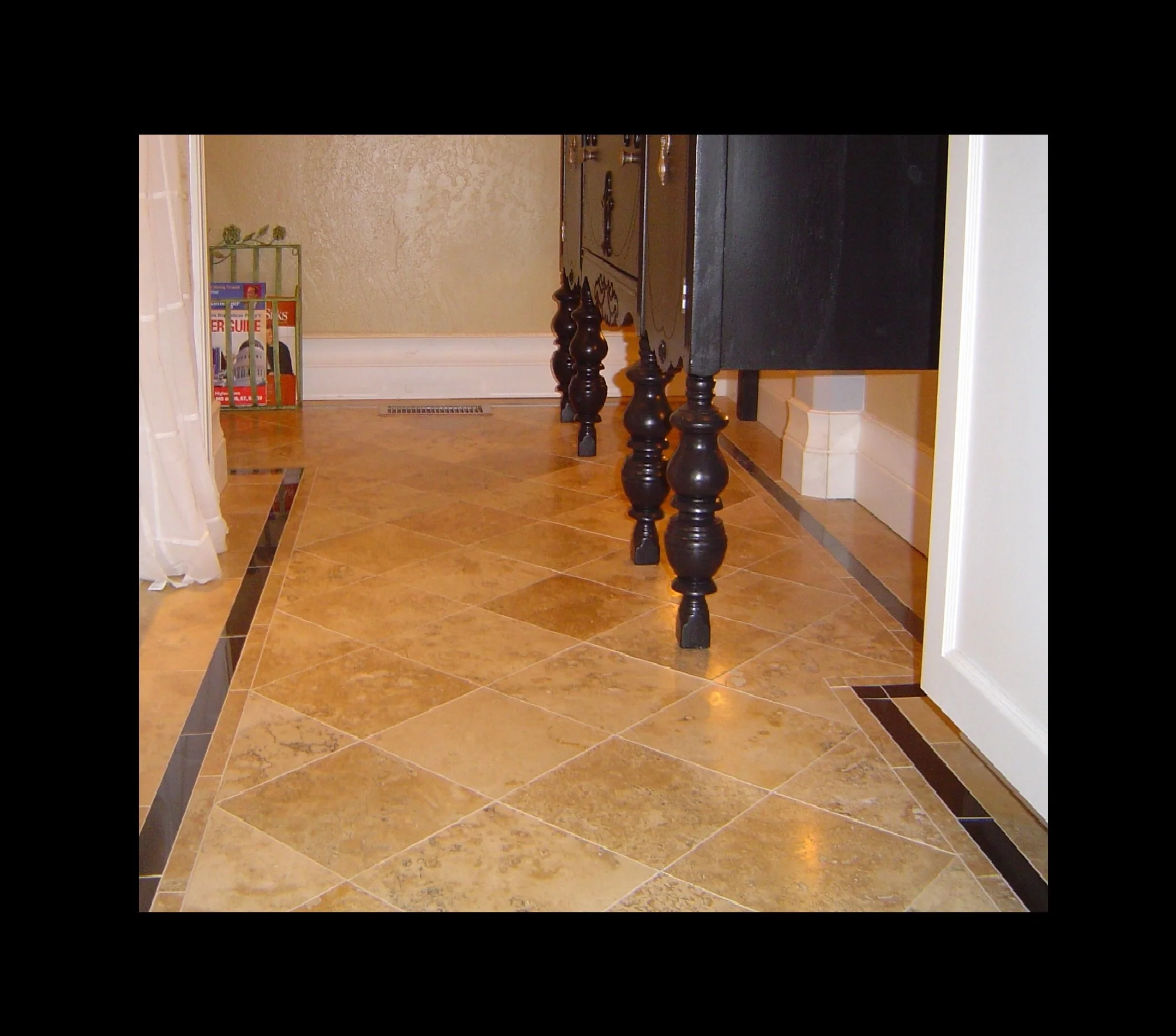 Travertine and Black Granite Floor.jpg