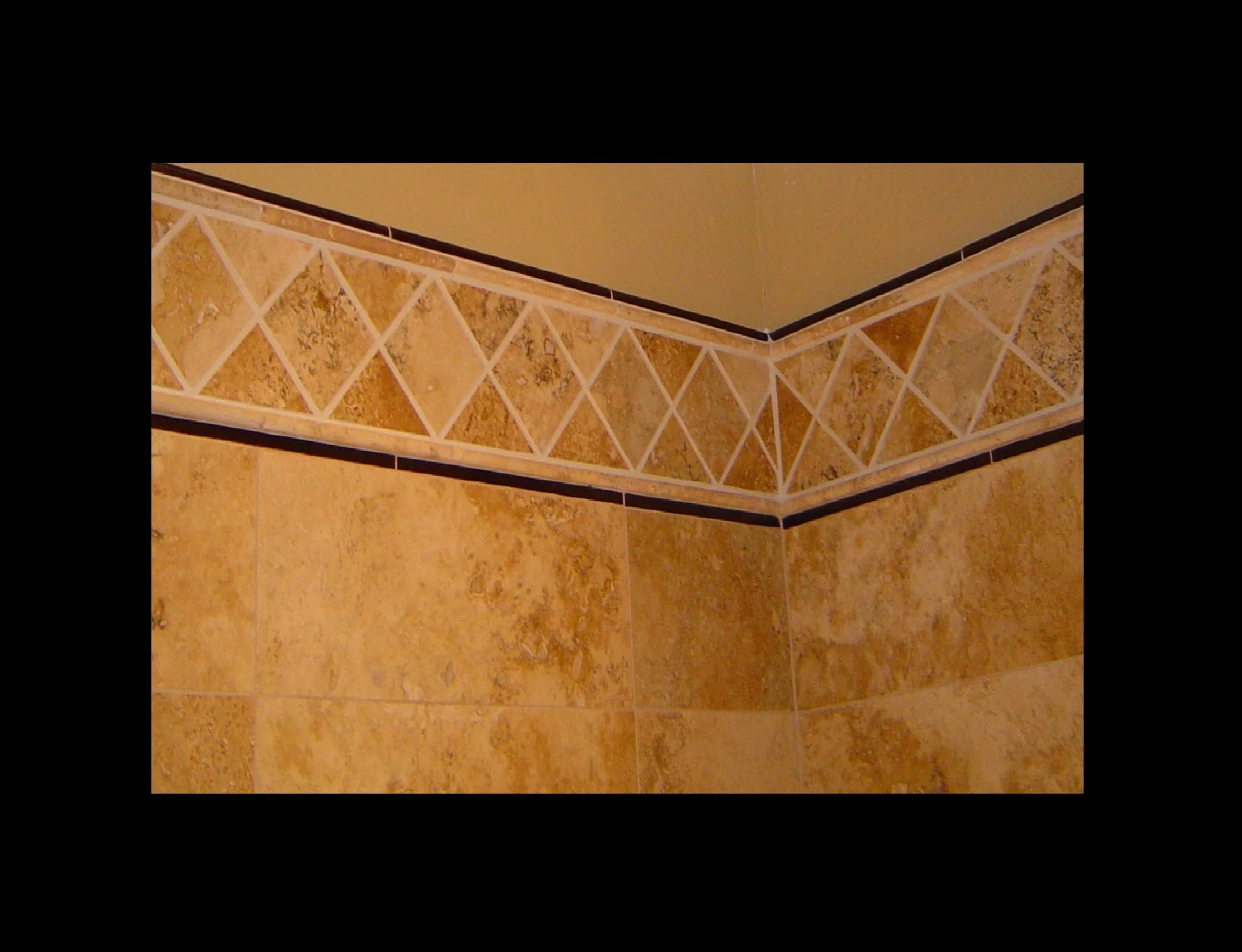 Travertine and Black Granite Wall Detail.jpg