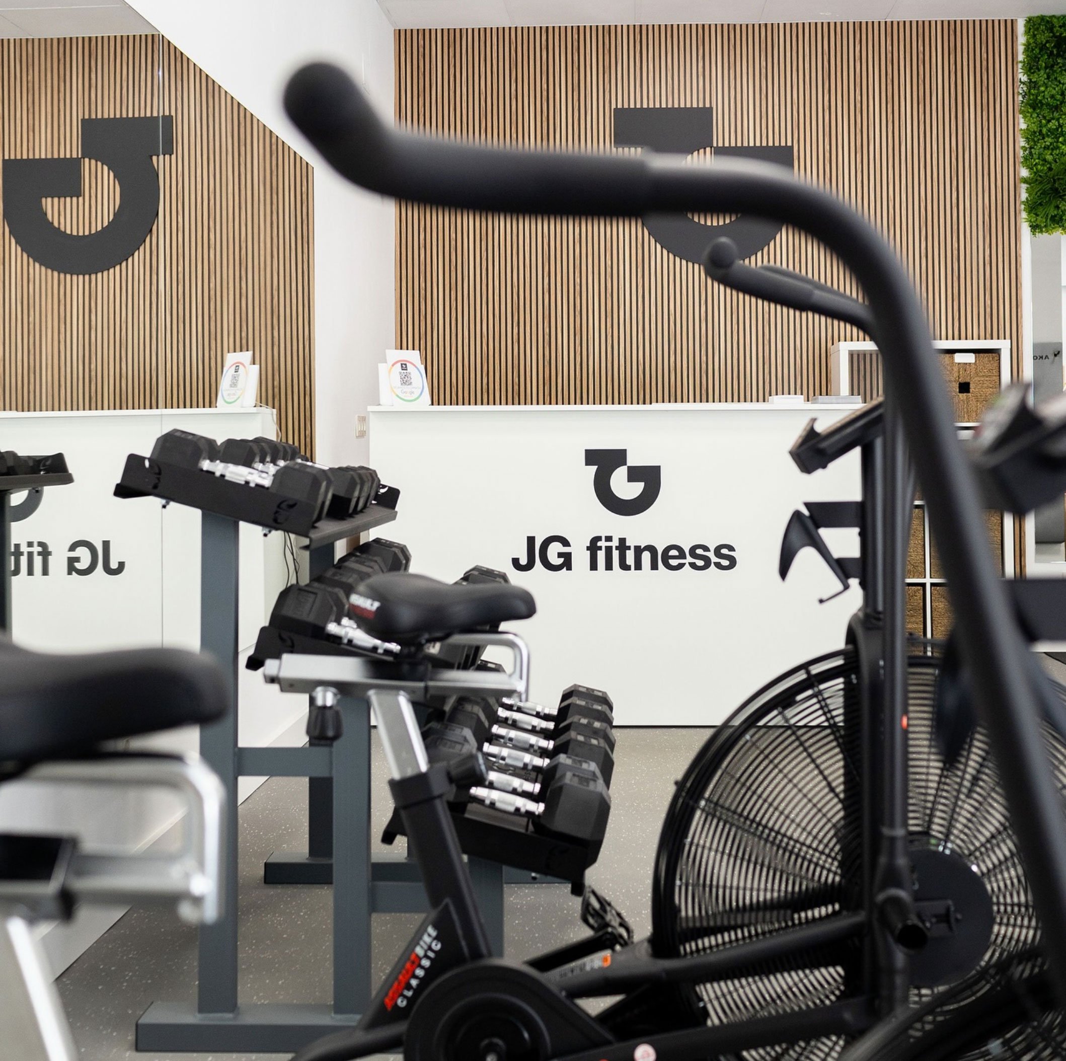 JG Fitness training centre interior with branded equipment.