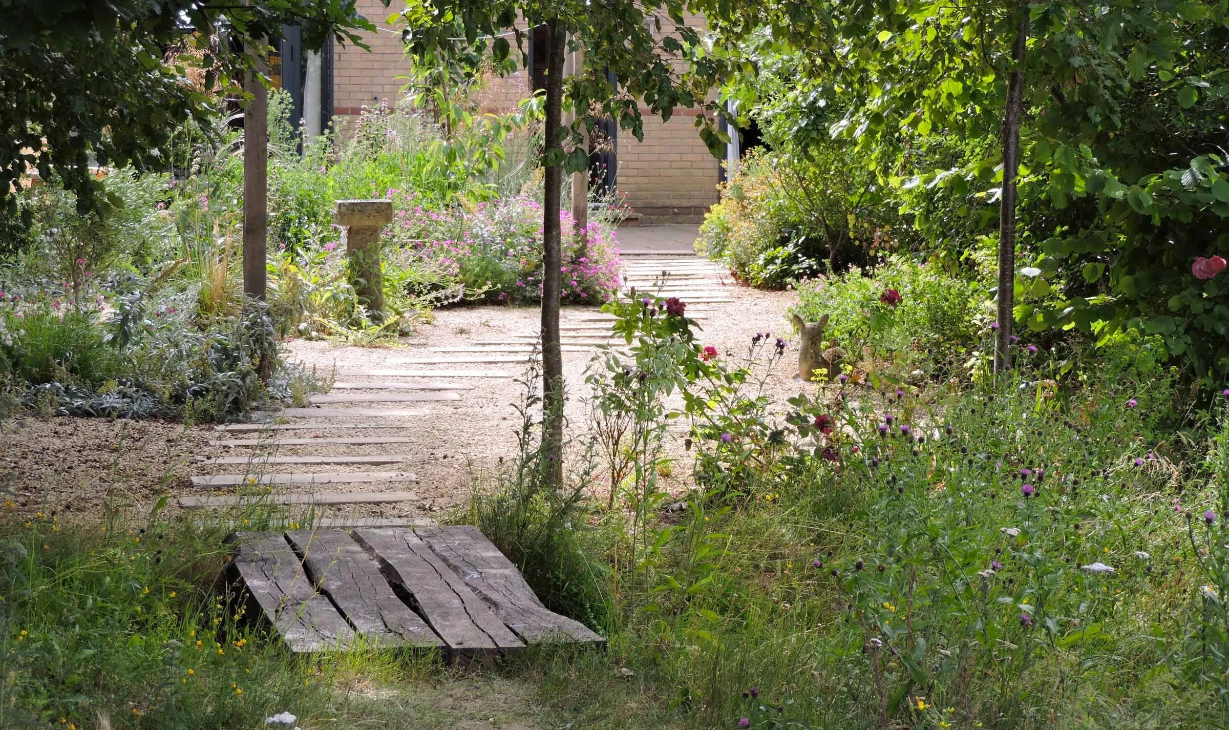nature garden with timber bridge