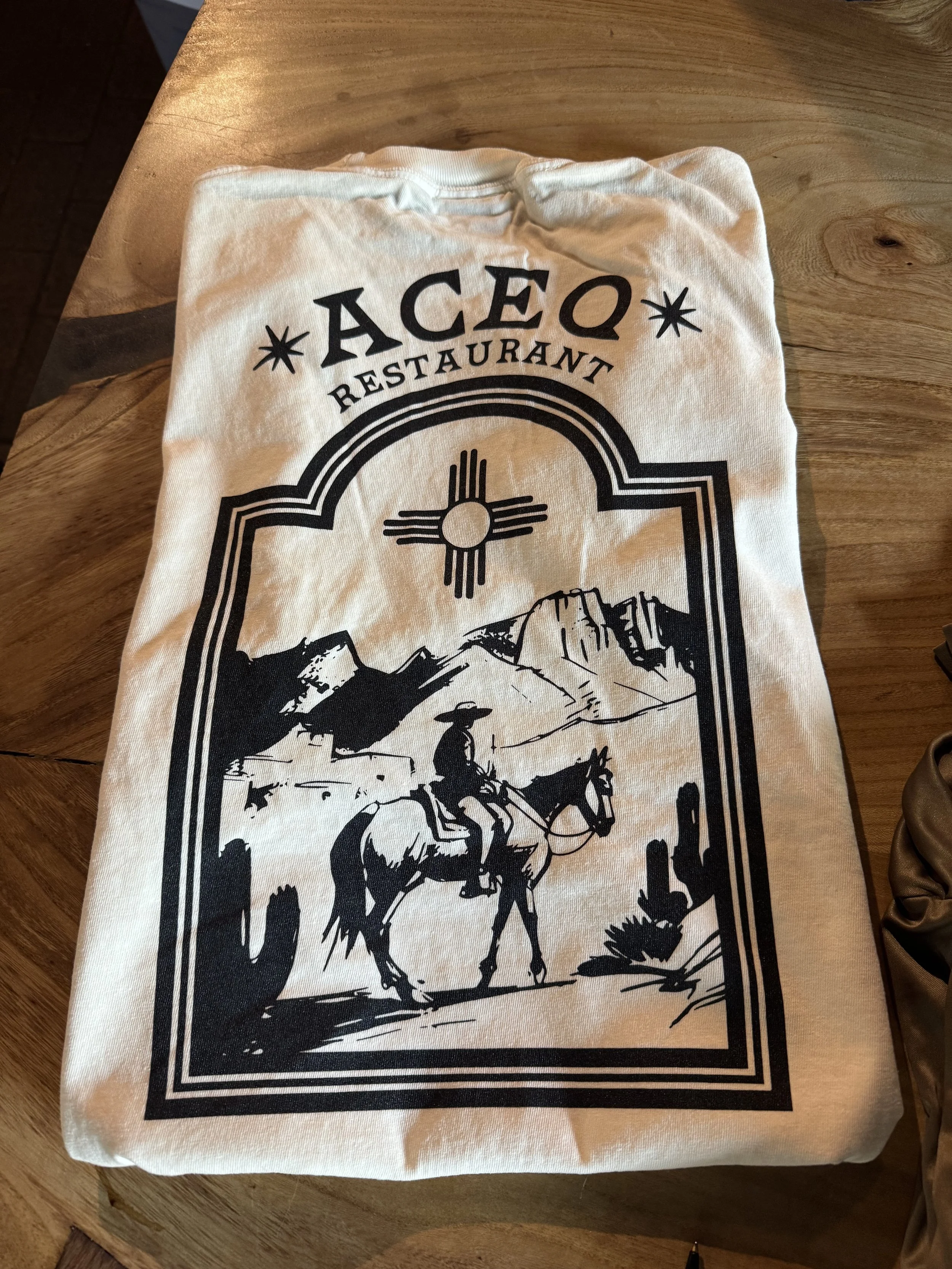 aceq back of shirt.jpg