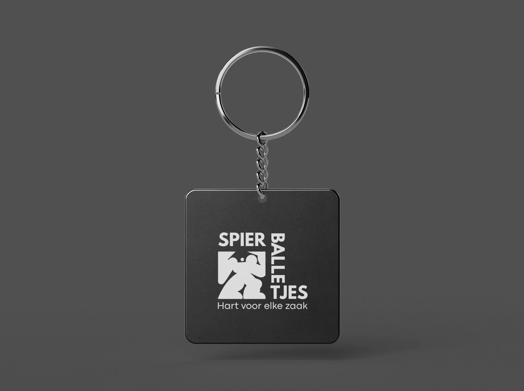 sleutel hanger logo ontwerp uniek spierballetjes.jpg