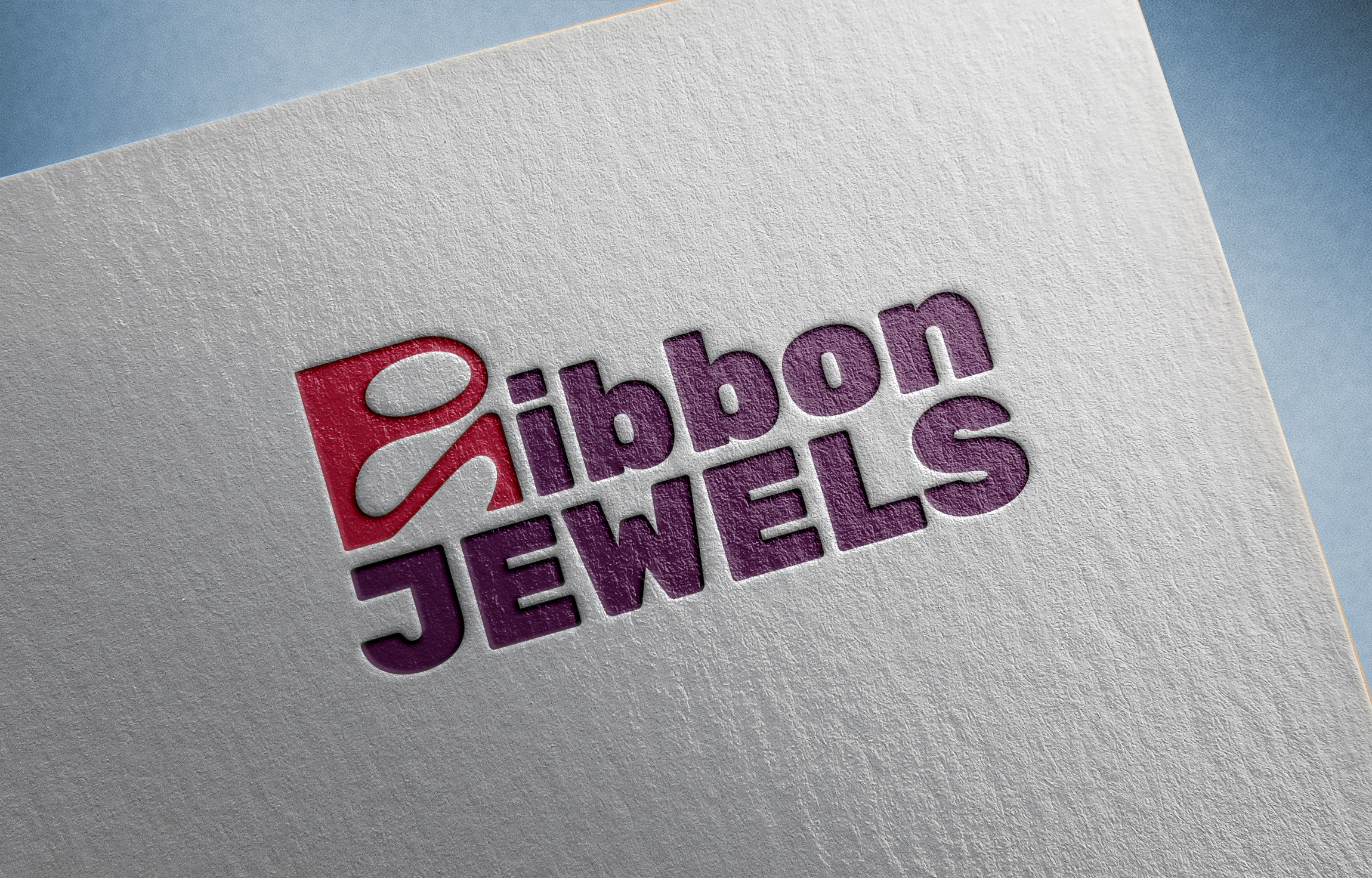 logo ontwerp door professioneel vormgever branding and boosting voor Ribbon jewels voorbeeld op papier