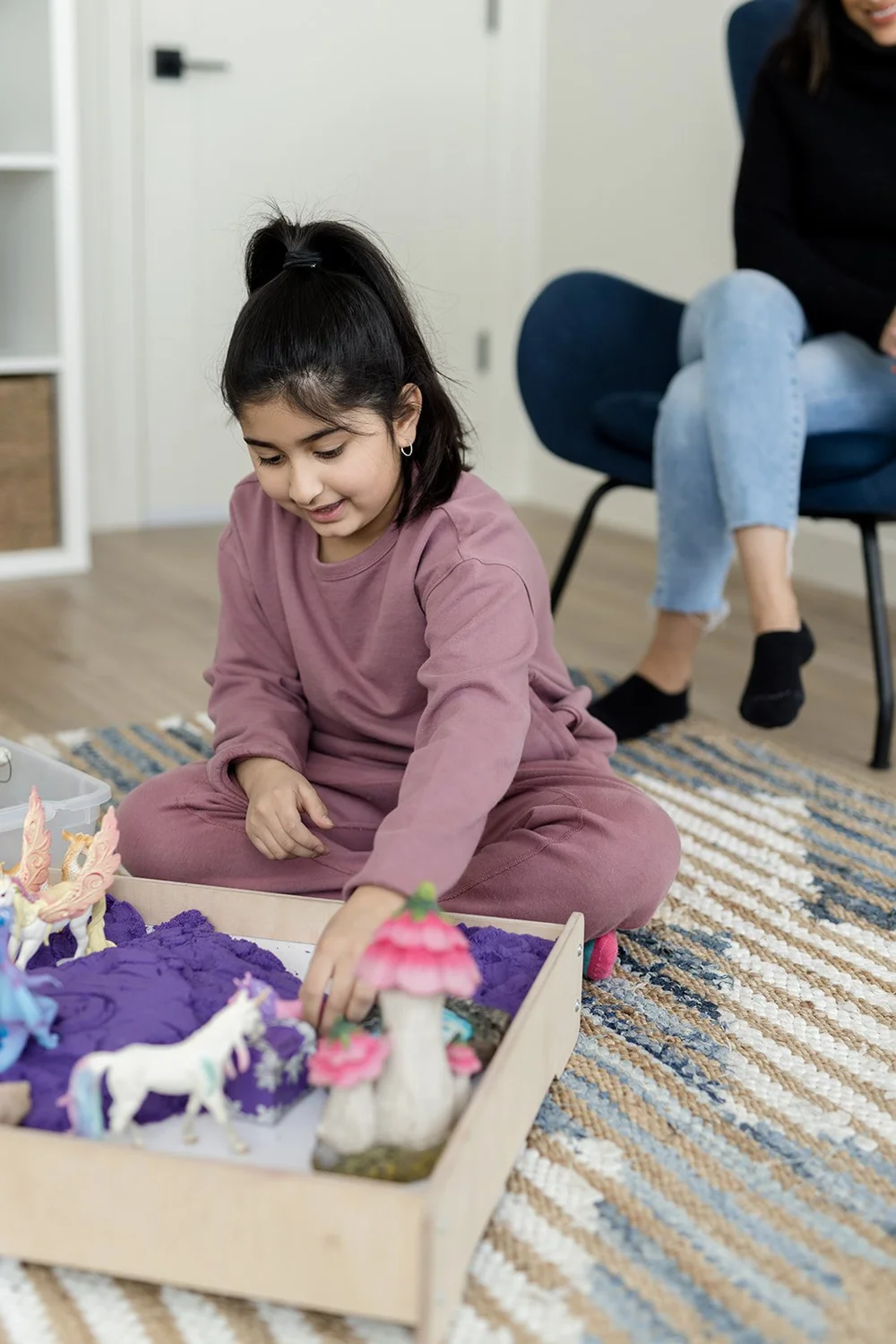 Child participating in social skills and peer relationship therapy at Creative Sky Psychology in Calgary, developing confidence, communication skills, and healthy friendships.