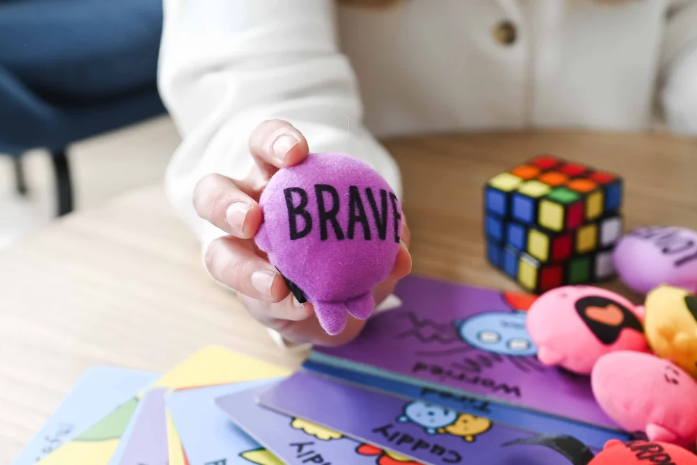 Child receiving phobia therapy at Creative Sky Psychology in Calgary, gradually facing specific fears and building courage, calm, and confidence.