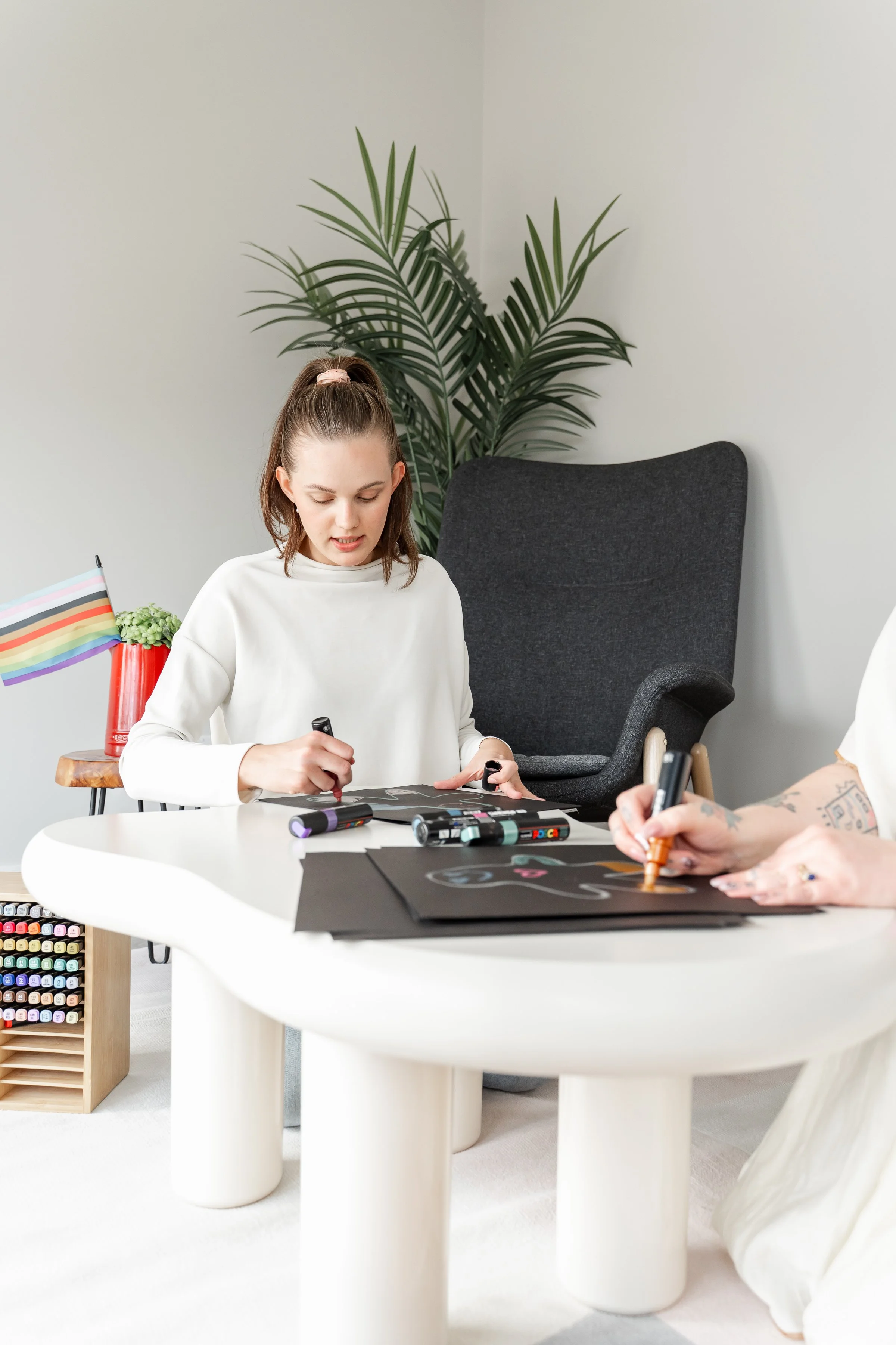 Child and psychologist working together on a calming activity during social anxiety therapy in Calgary at Creative Sky Psychology, building confidence and connection.
