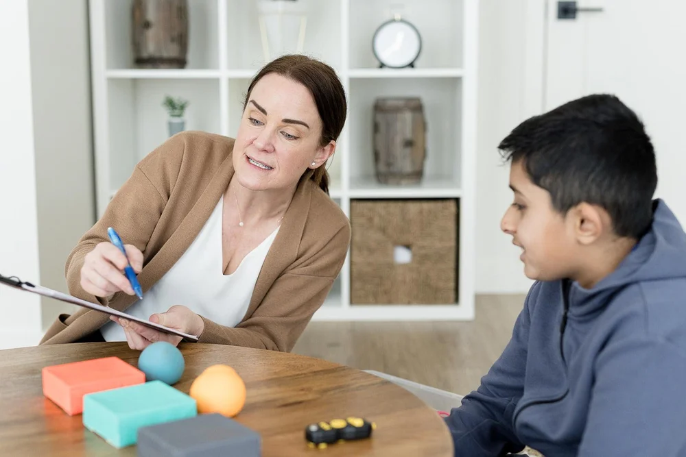 Child receiving school refusal therapy at Creative Sky Psychology in Calgary, building confidence, coping skills, and a gradual return to school.