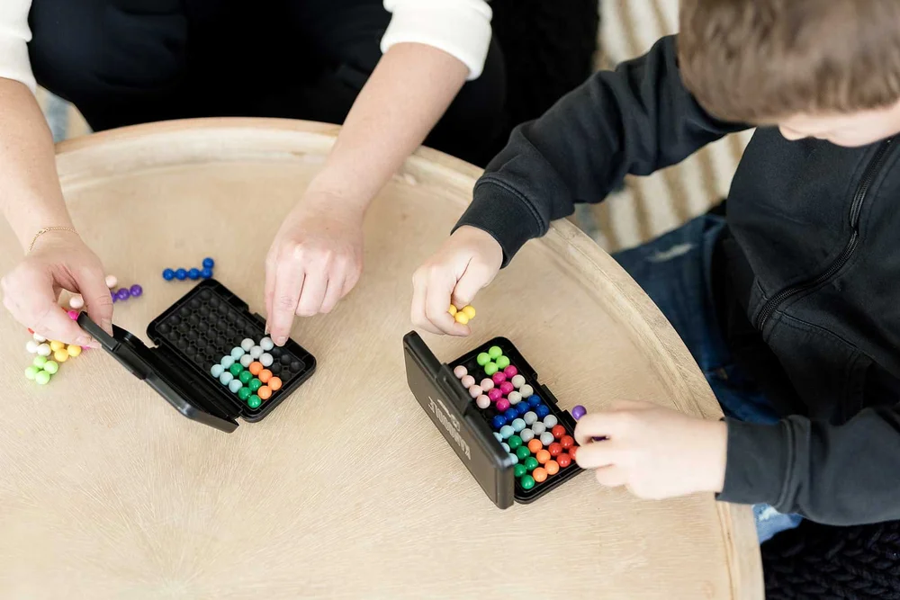 Child receiving autism and neurodiversity-affirming therapy at Creative Sky Psychology in Calgary, supporting sensory needs, emotional regulation, communication, confidence, and connection.