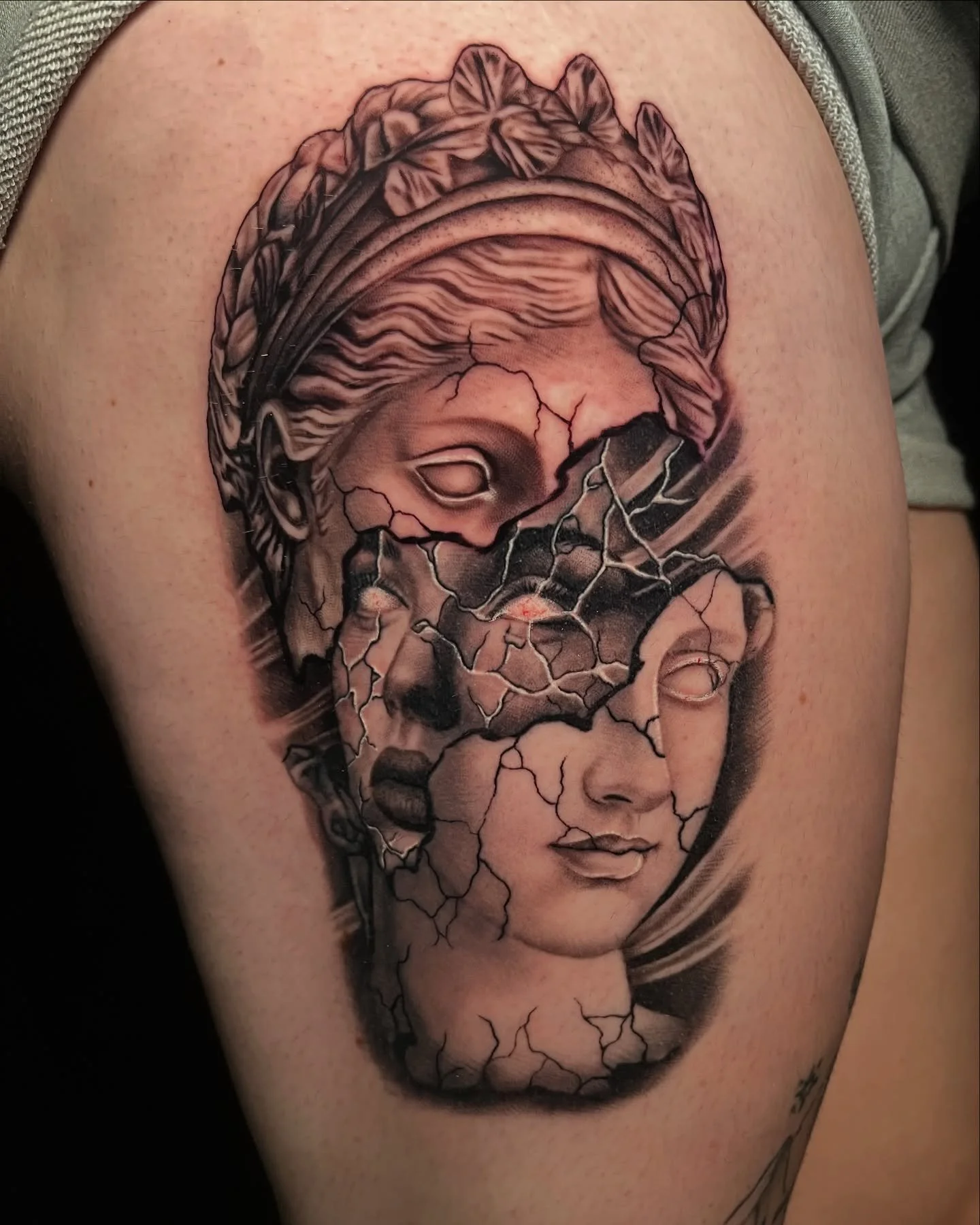 black and grey realism greek statue tattoo