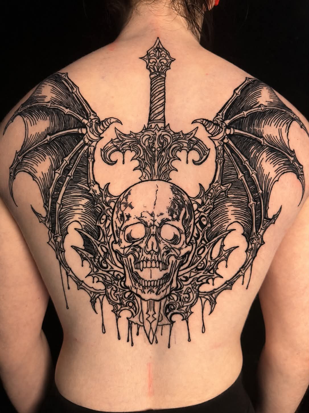 Engravers Style Skull and Batwings and Sword