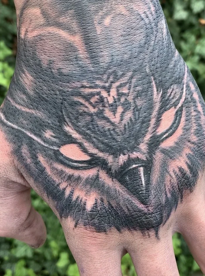 hand tattoo hawk
