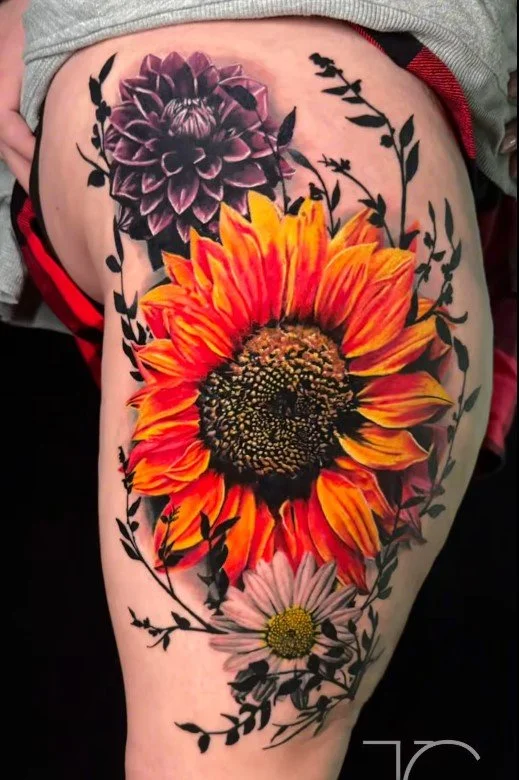 vibrant color flower sunflower tattoo, thigh tattoo idesa