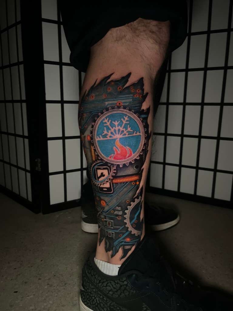 biomechanical tattoo leg sleeve