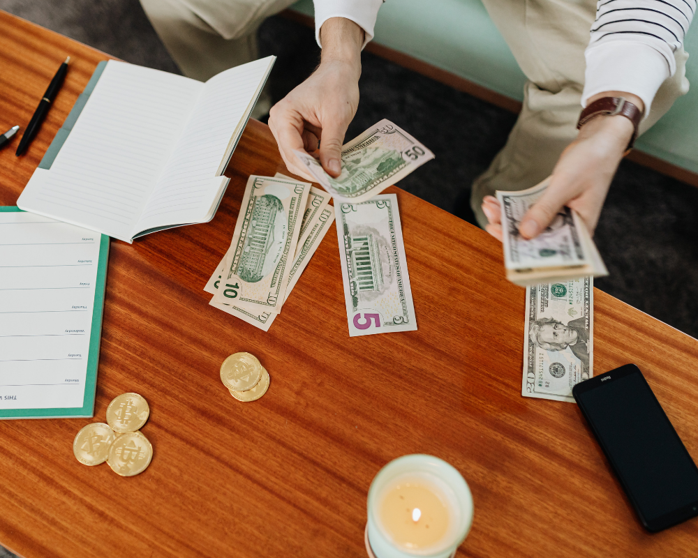 image of person counting money to build a budget for an H-2A contract