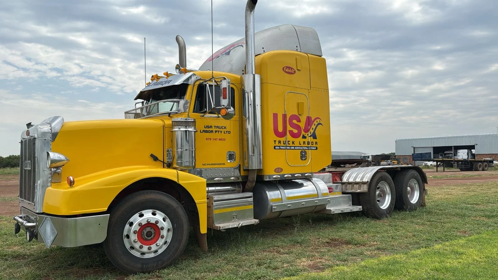 large yellow peterbilt H2A training truck