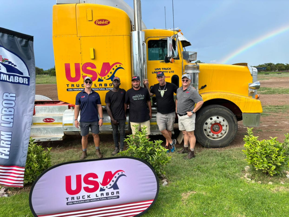 H2A jobs training grads standing in front of yellow semi truck