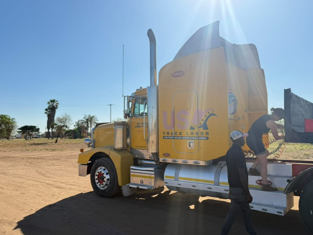 image of a truck labor H2A candidate practicing connecting a trailer to prepare for an H2A job interview