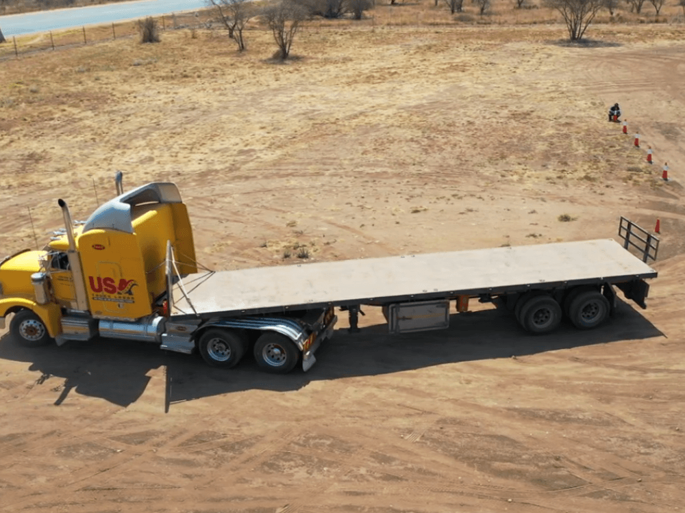 image of farm semi truck practicing driving on dirt
