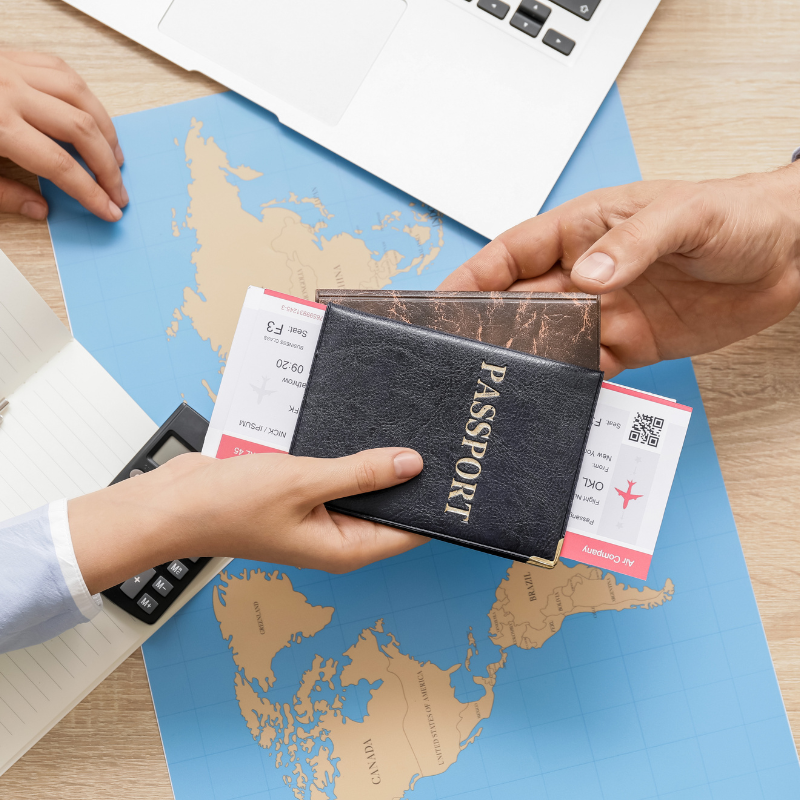 image of passport and plane tickets for preparing to work in America