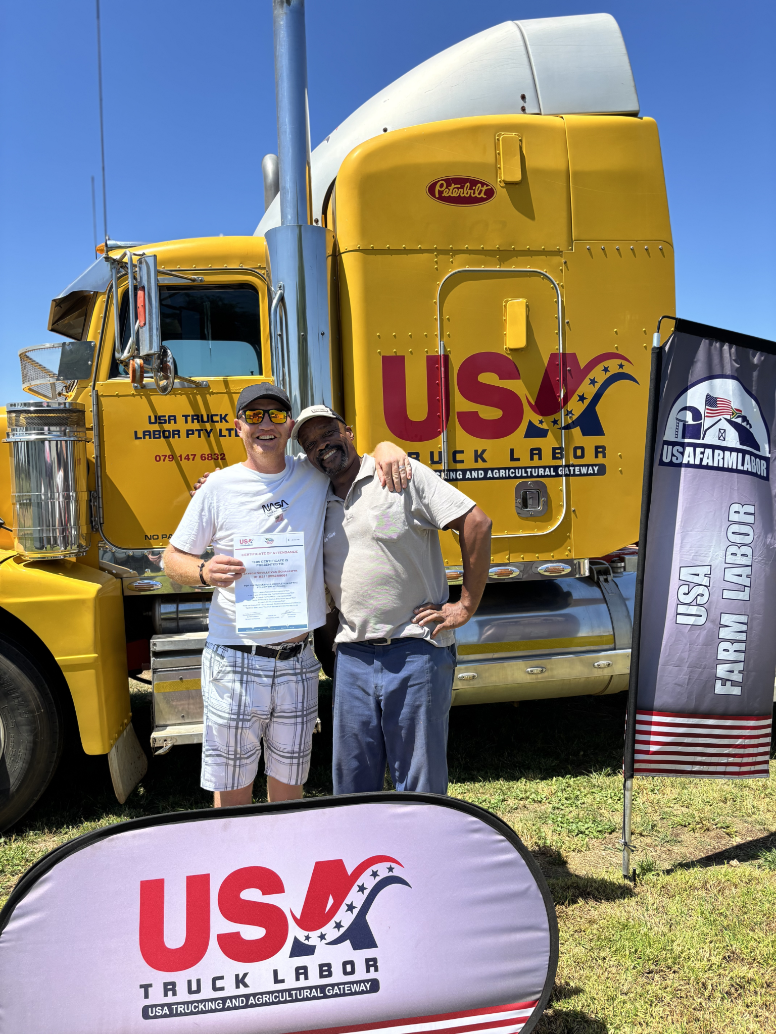 program grad with instructor after being trained for seasonal farm work in America