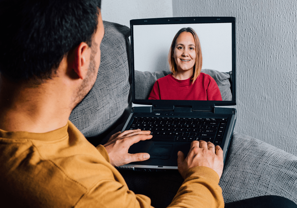 image of h2a worker using facetime to connect with loved ones for curing homesickness during h2a season